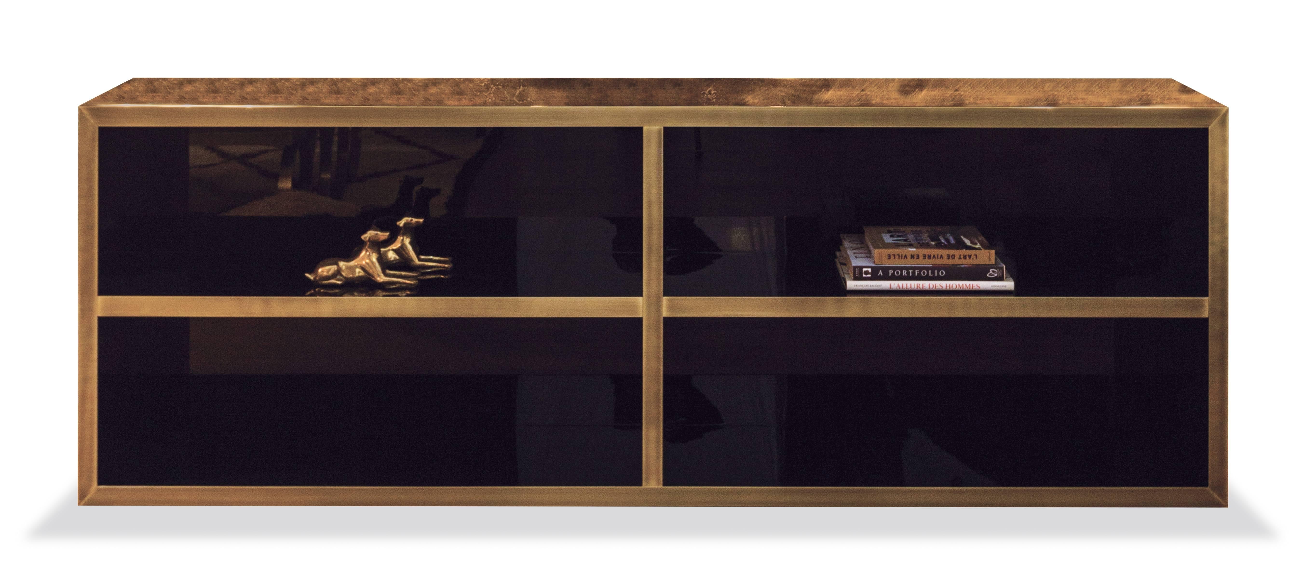 Simple but elegant and functional brass fronted single or double access bookcase with beautiful Makassar ebony veneer.

Measures: cm. 230 x 40 x 76 H.

(Pic 1): Double-sided bookcase:
Semi gloss Makassar ebony veneered.
Metal outlines: Gloss