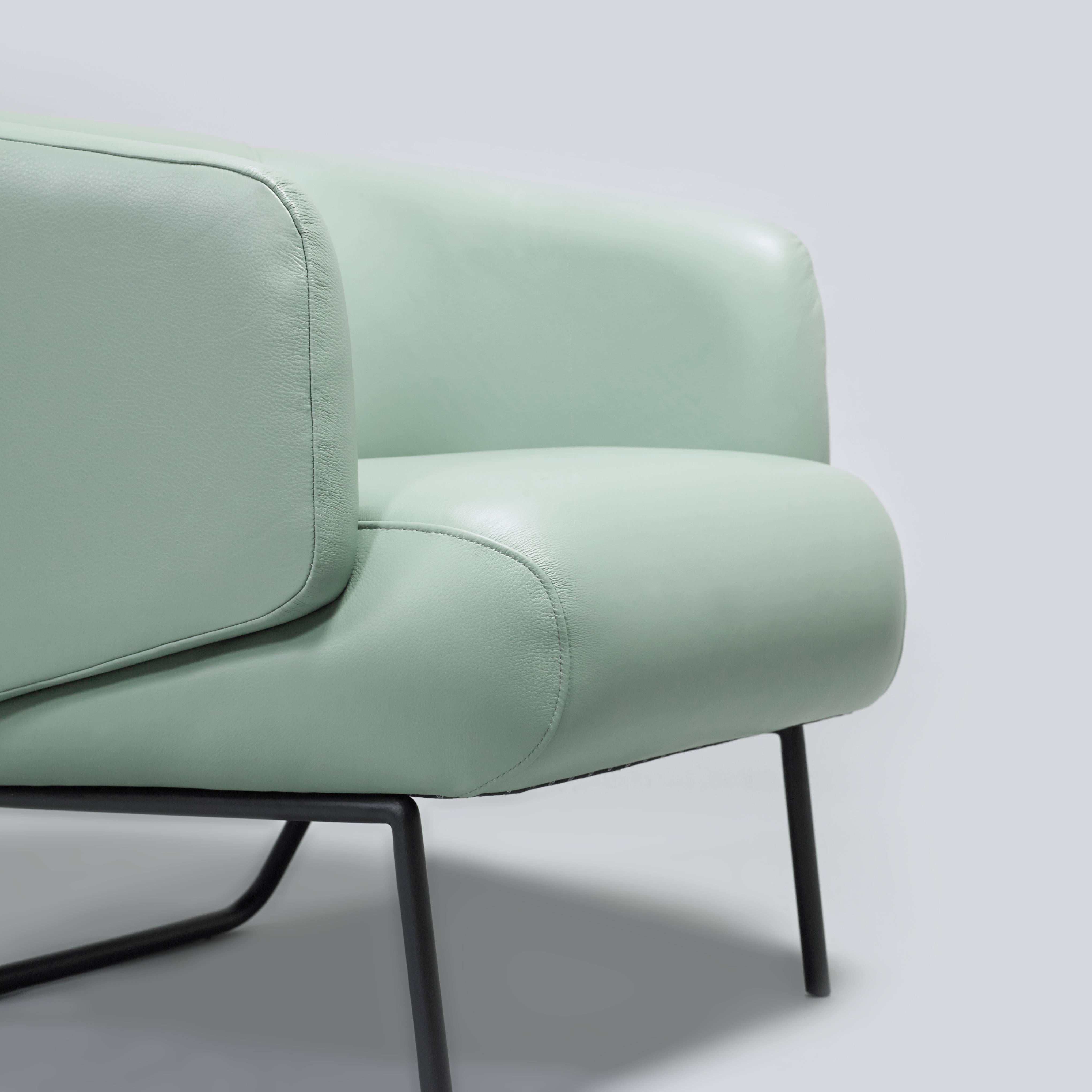 Portuguese European modern pale teal green leather and black epoxy armchairs For Sale
