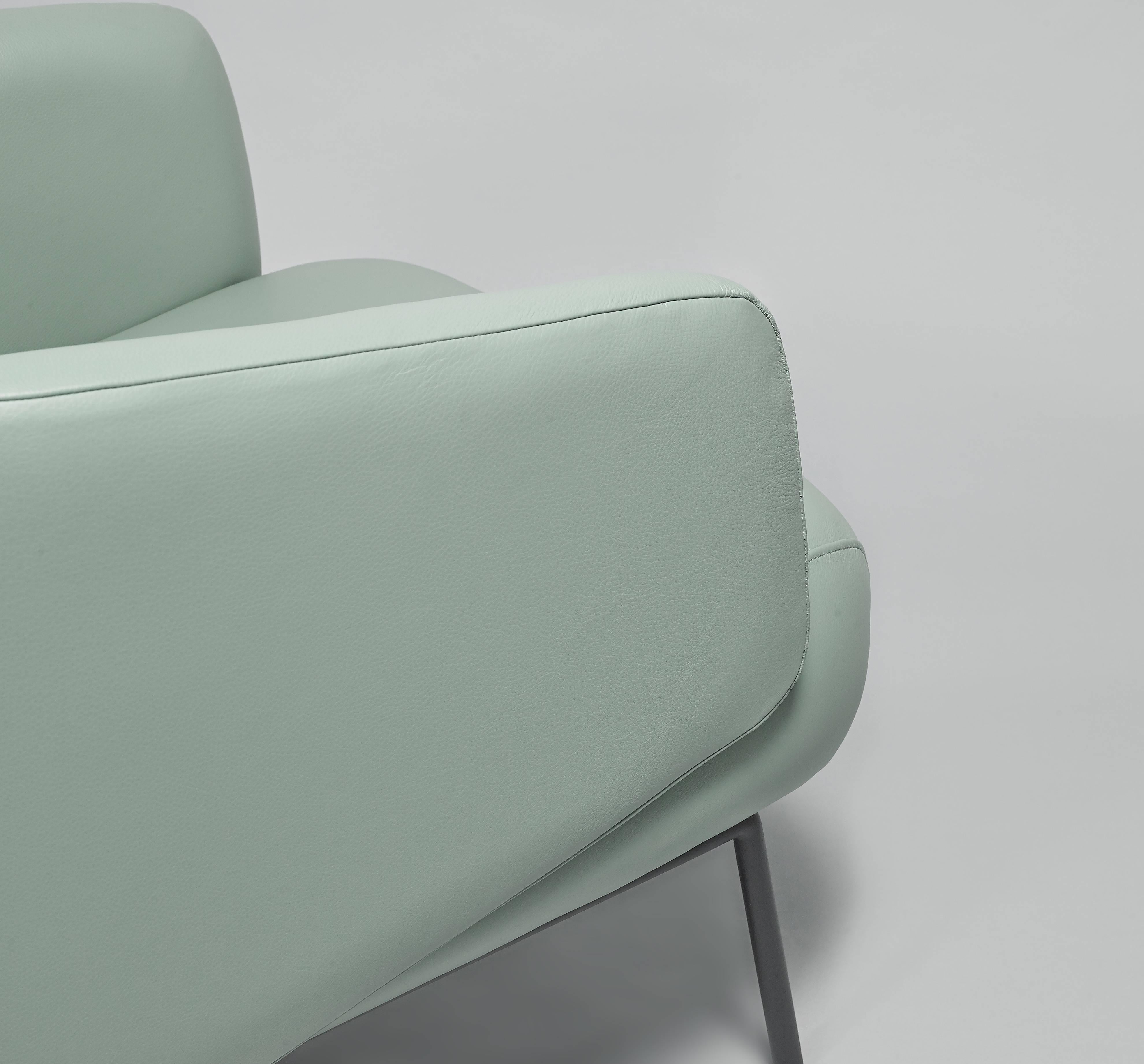 European modern pale teal green leather and black epoxy armchairs In Excellent Condition For Sale In Sydney, NSW