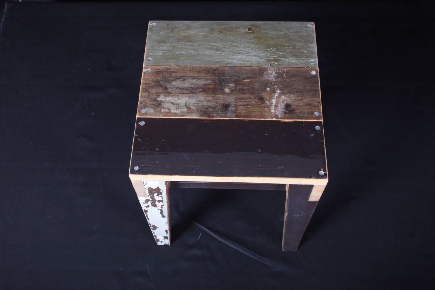 Two unique stools made of reclaimed scrap wood in oak by Piet Hein Eek.