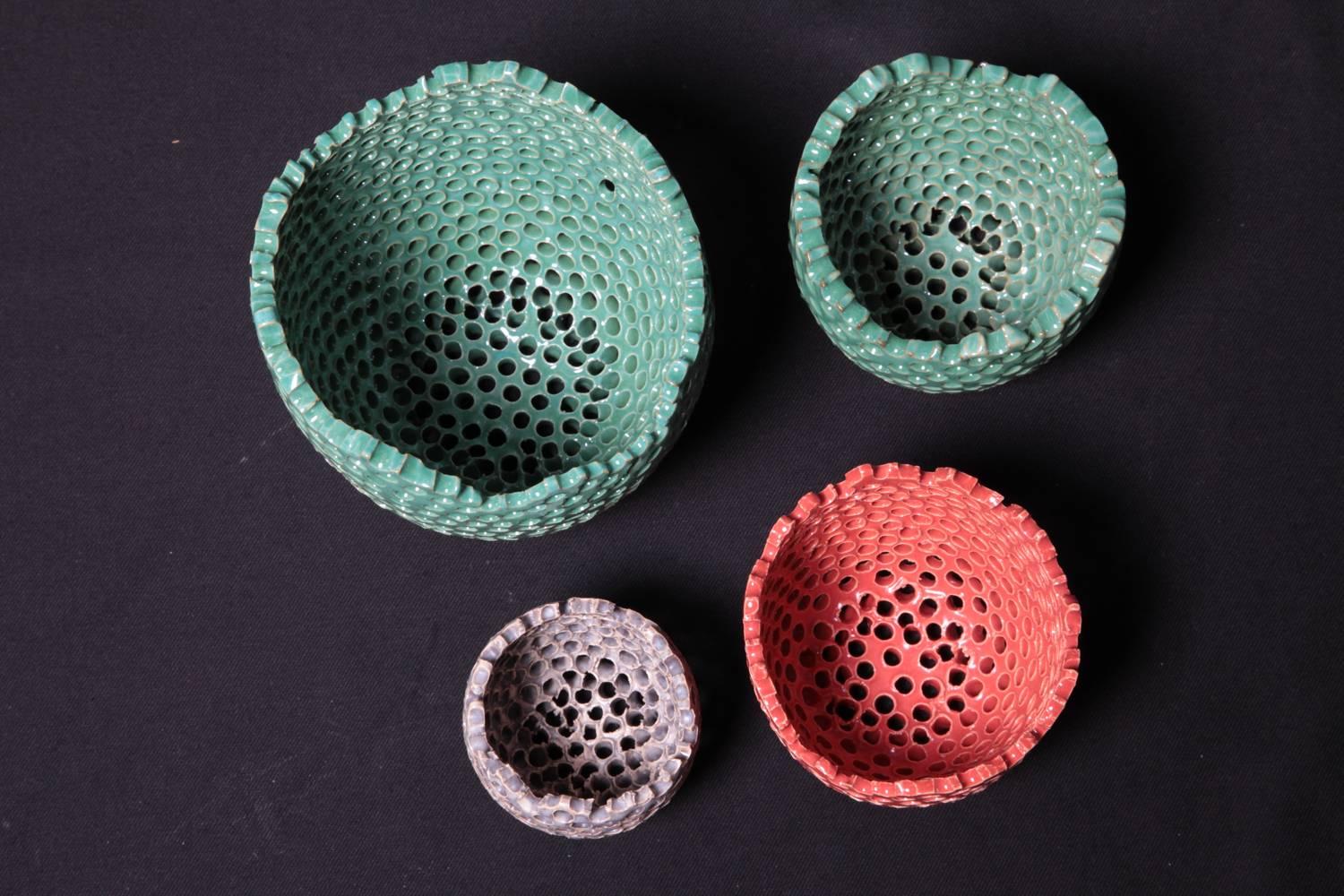 Ceramic bowls by Susanne Protzmann.

Green I H: 13 cm / 5.12 in Ø: 12.5 cm / 4.92 in.
Green II H: 9 cm / 3.54 in Ø: 9.5 cm / 3.74 in
Red H: 9 cm / 3.54 in Ø: 10 cm / 3.94 in.
Grey H: 6.5 cm / 2.56 in Ø: 6.5 cm / 2.56 in.