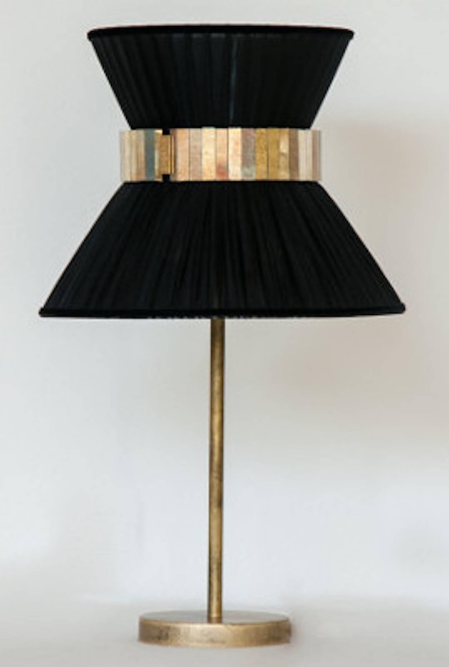 Designed and handmade in Italy by Sabrina Landini, the Tiffany lamp is inspired by the hat worn by Audrey Hepburn in Breakfast at Tiffany's. Silk organza shade, with antique hand silvered glass detail and brass finished base.