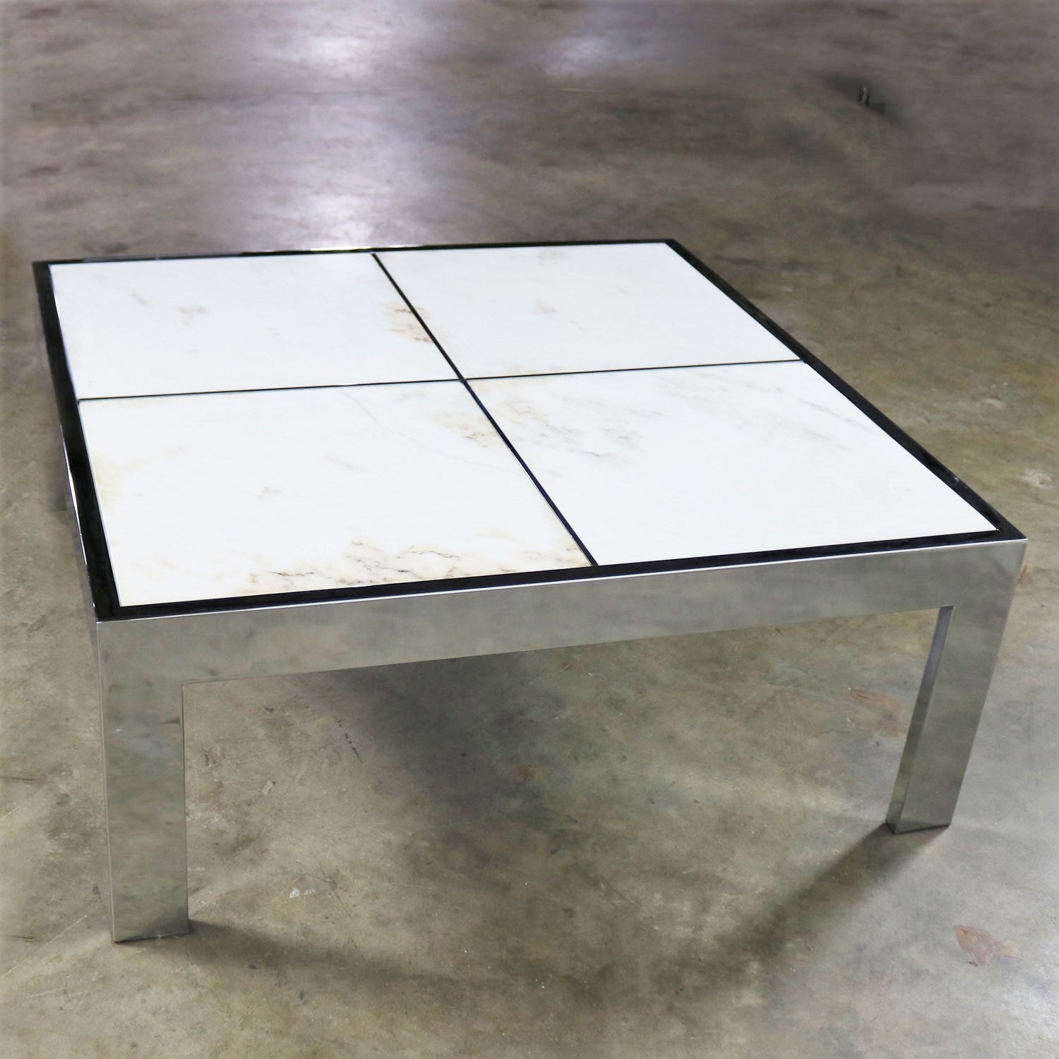 Gorgeous modern chrome and white marble coffee or cocktail table which is attributed to The Pace Collection with Leon Rosen as the designer. This table is not marked but all sizes and materials point to this attribution. It is in wonderful vintage