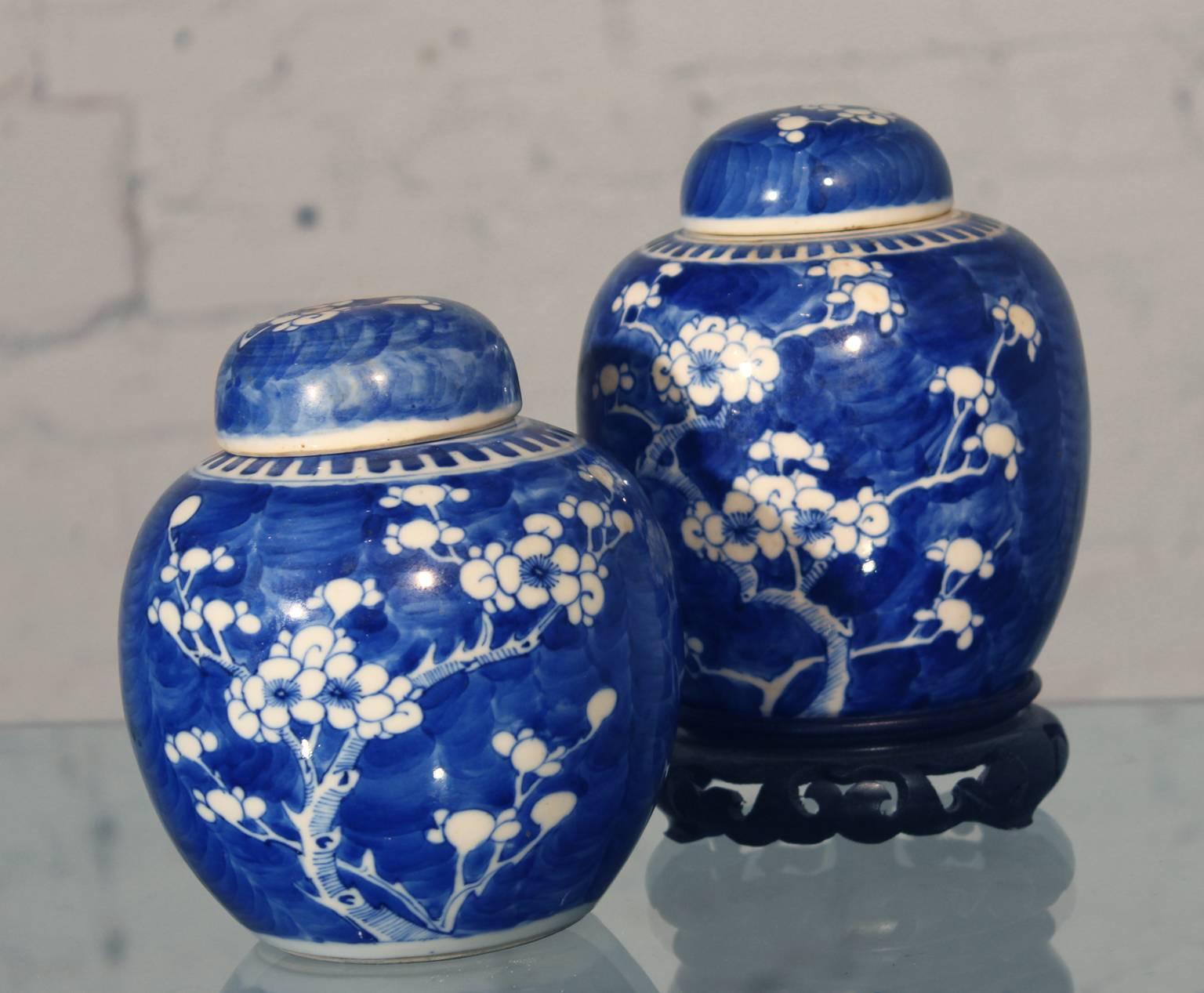Handsome pair of Chinese porcelain ginger jars in wonderful to excellent condition with the double circle Kangxi mark. Most likely 19th century.

This is an outstanding pair of antique ginger jars with the double circle Kangxi mark and decorated