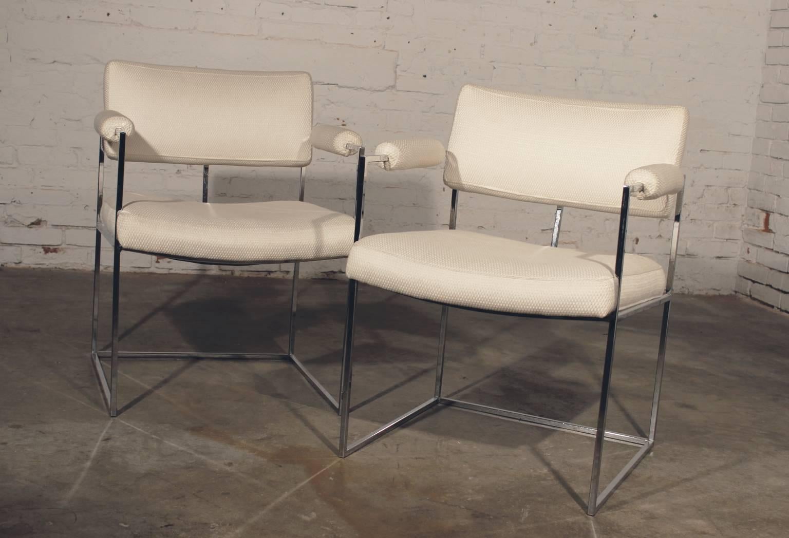 Vintage pair of white and chrome Milo Baughman for Thayer Coggin 1188 dining chairs. In age appropriate condition but with repairs.

The 1188 chair by Milo Baughman is touted as being his favorite chairs. He even chose it to use in the home of his