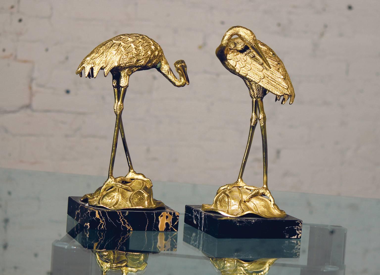 Wonderful pair of beautifully made and elegant brass cranes from Italy. They do retain their original paper 