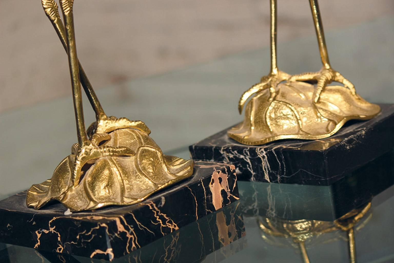 Brass Cranes on Black Marble Bases 1