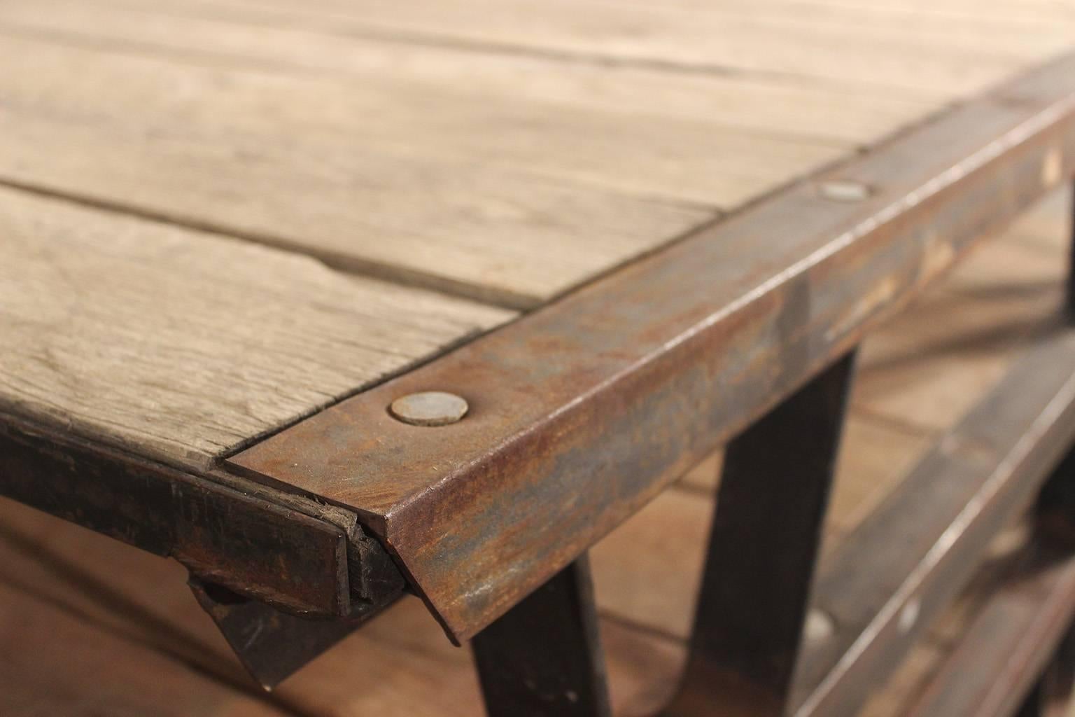 Industrial wooden pallets with iron rustic frame. Make wonderful coffee tables. Condition is as pictured. Over 100 available. Priced per item. These should be easy to ship, they are pallets you know!

These circa 1930's industrial wooden pallets