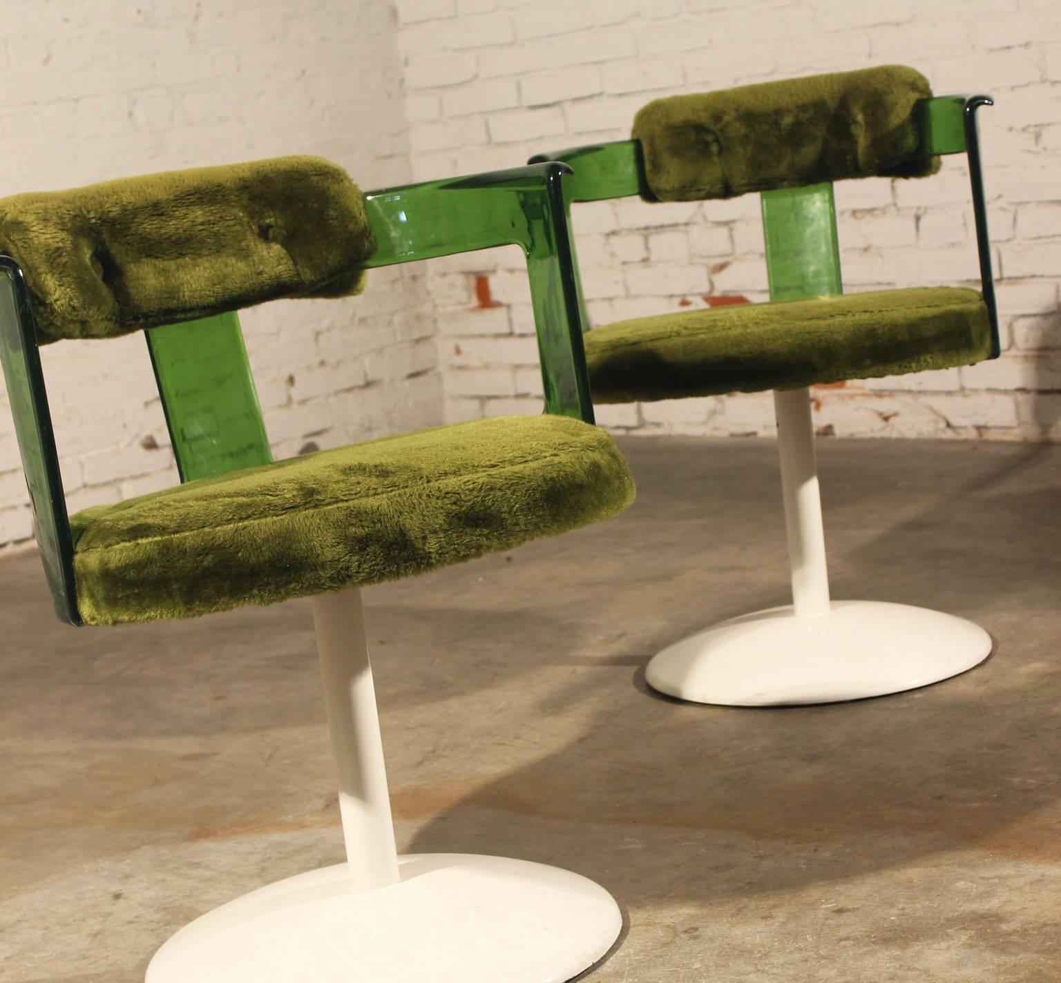 Awesome pair of Mod Daystrom Furniture tulip style green lucite and faux fur swivel chairs circa 1970 mid-century modern. In wonderful vintage condition.

OMG!!! Are these not the most cool vintage mid-century modern chairs? Circa 1970 Mod green