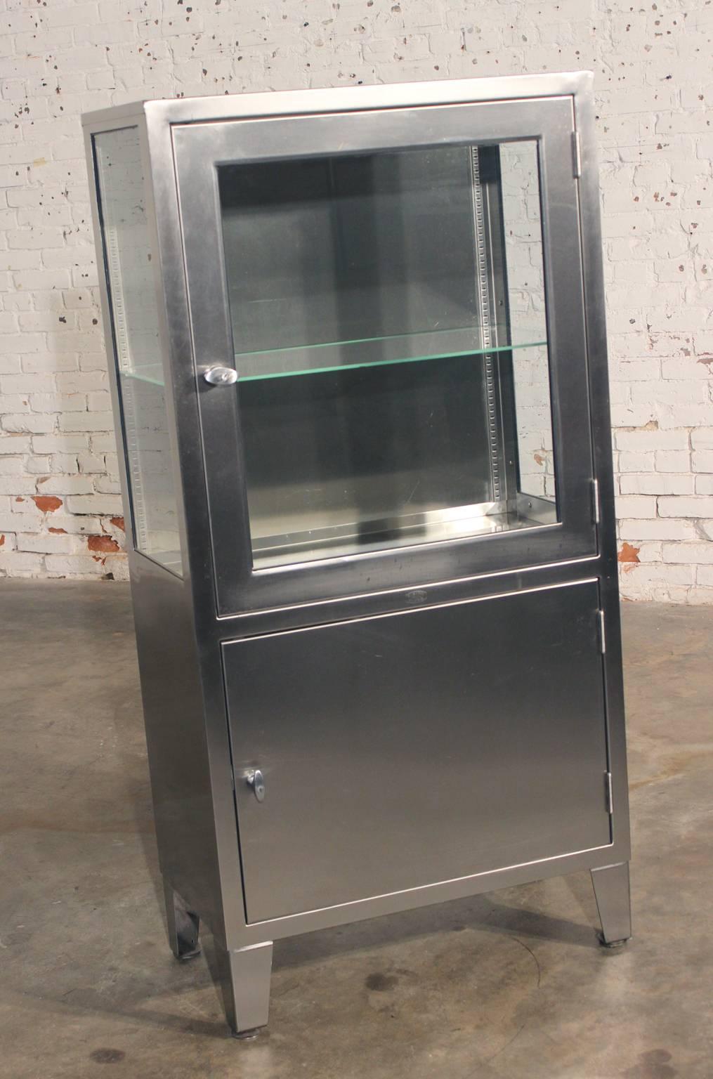 Fabulous! Wonderful! Incredible! Vintage industrial stainless steel medical cabinet converted for lighted display. In great vintage age appropriate condition. Three cabinets available. Priced per cabinet. UPDATE: Only two cabinets are left. The one