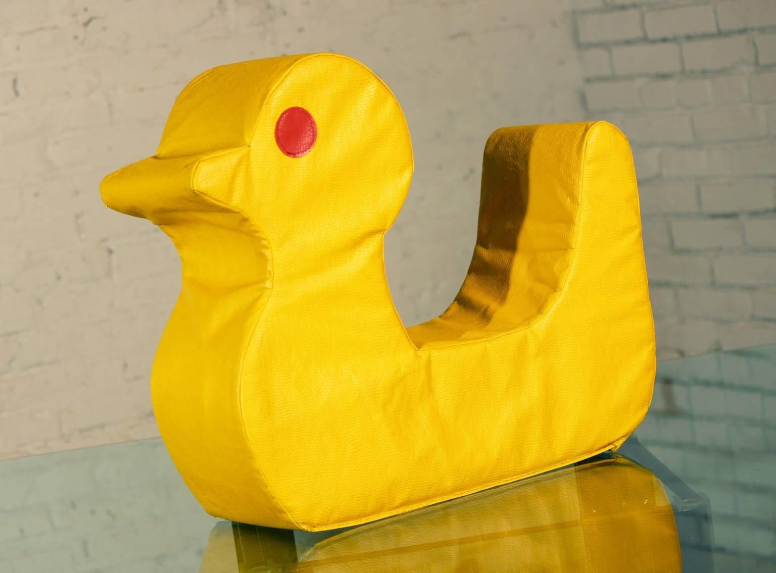 Awesome Mid-Century pop art yellow duck pillow, cushion or child's seat. In great vintage condition. A couple tiny seam stress tears as you would expect with age.

Just Ducky but this one is too large to take in the bath with you!! What a