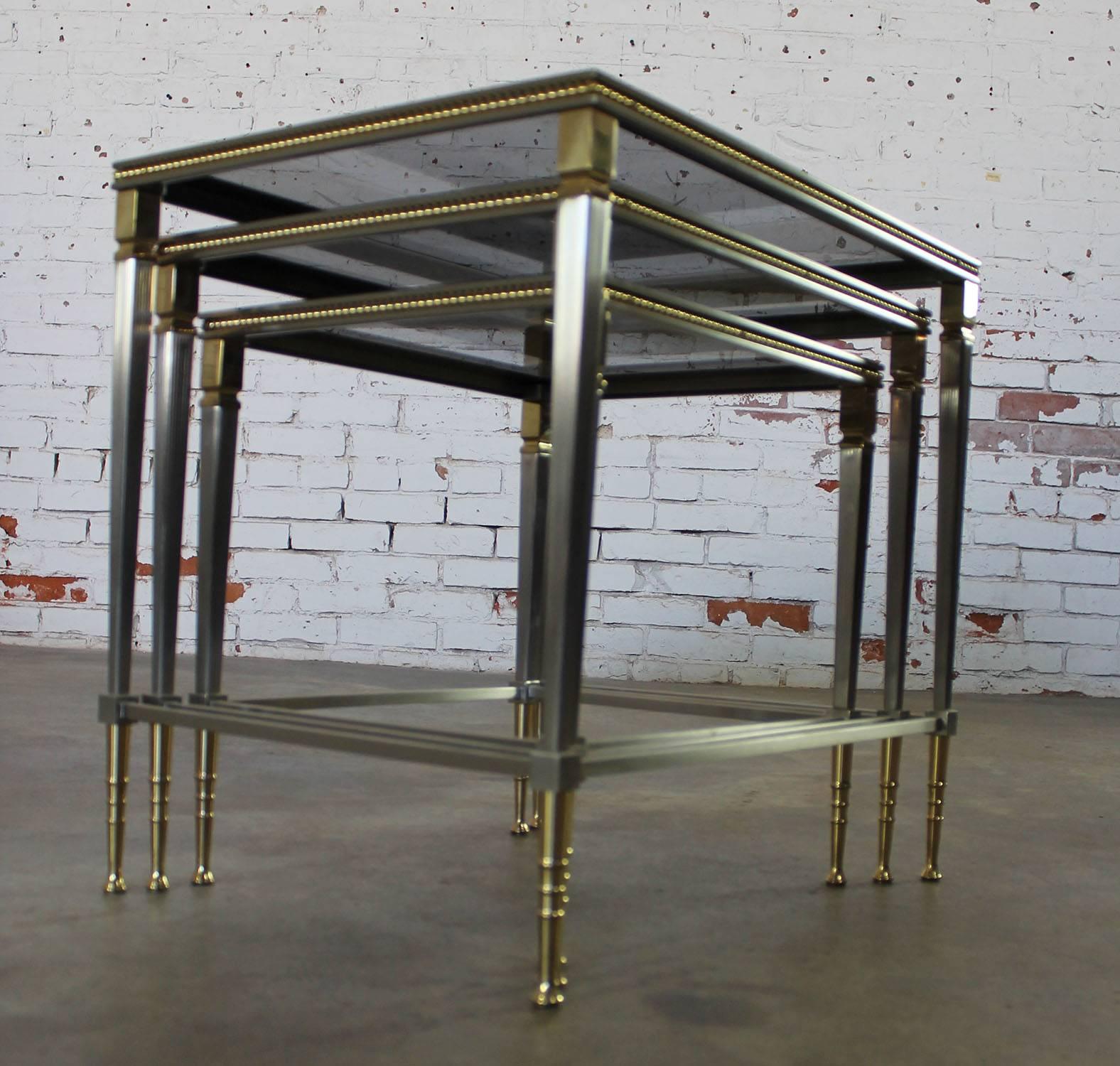 Contemporary Brass and Stainless Nesting Tables with Mirror Edged Glass Tops