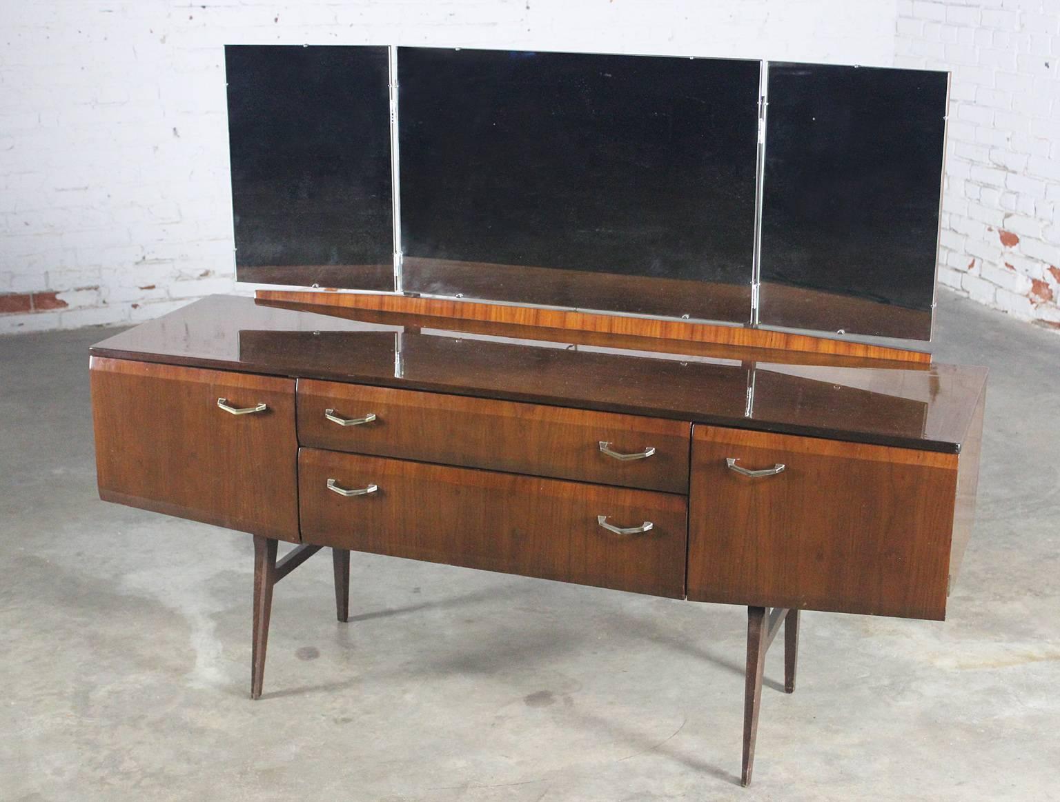 Lovely vanity by Meredew Furniture Manufacturers. Part of the Tola bedroom furniture and Meredew Design, 1962 line attributed to Alphons Loebenstein. It is in great vintage condition. See long description for details.

Oh La La!!! This is an