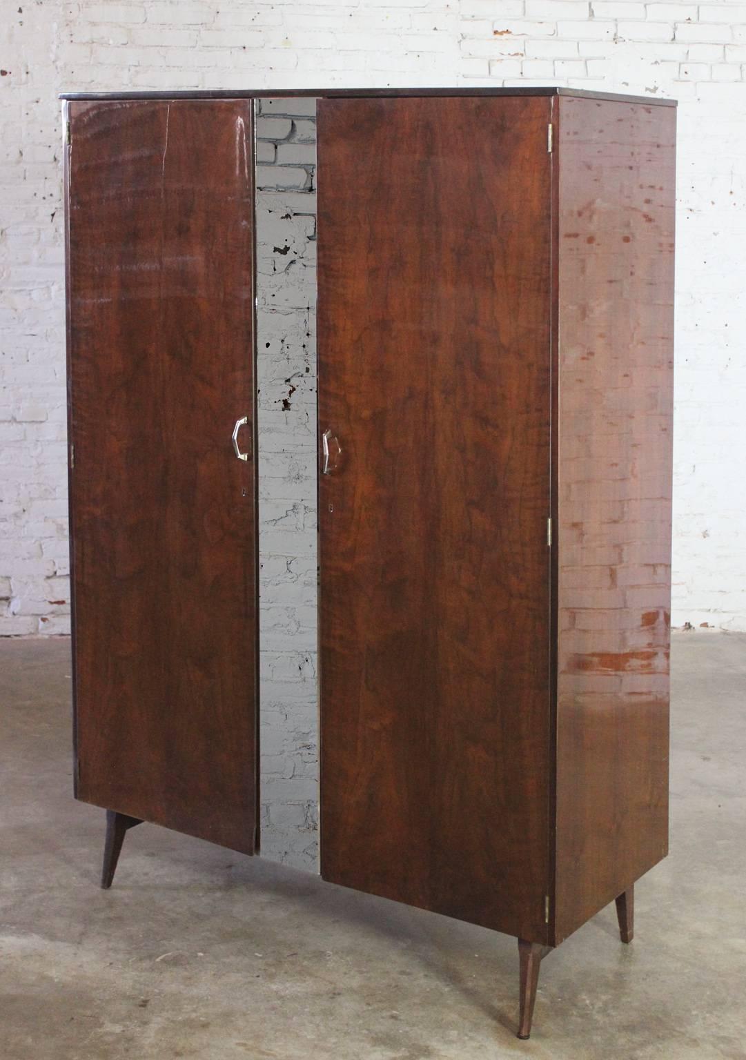 Very handsome wardrobe by Meredew Furniture manufacturers. Part of the tola bedroom furniture and Meredew Design 1962 line attributed to Alphons Loebenstein. It is in great vintage condition. See long description for details.

This wonderful