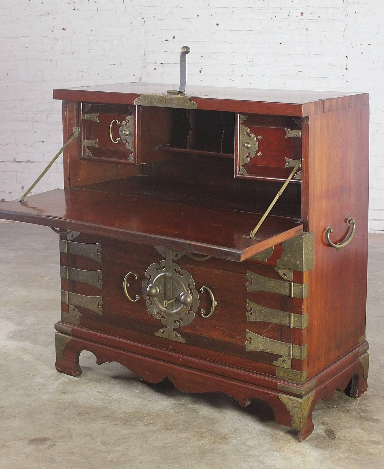 Impressive Asian Campaign-style secrétaire. All one piece construction with incredible brass embellishments and hardware. This Korean-style drop front desk is in wonderful vintage condition. Please see long description for details.

Gorgeous,