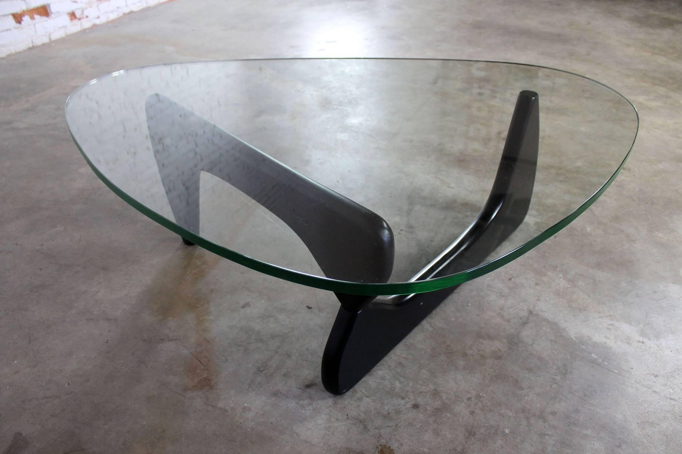 Classic Isamu Noguchi IN-50 black coffee table in very good vintage condition.

What can get more Classic Mid-Century design than a Noguchi coffee table? This one is vintage and we believe, circa 1980. It is in wonderful condition. No markings to