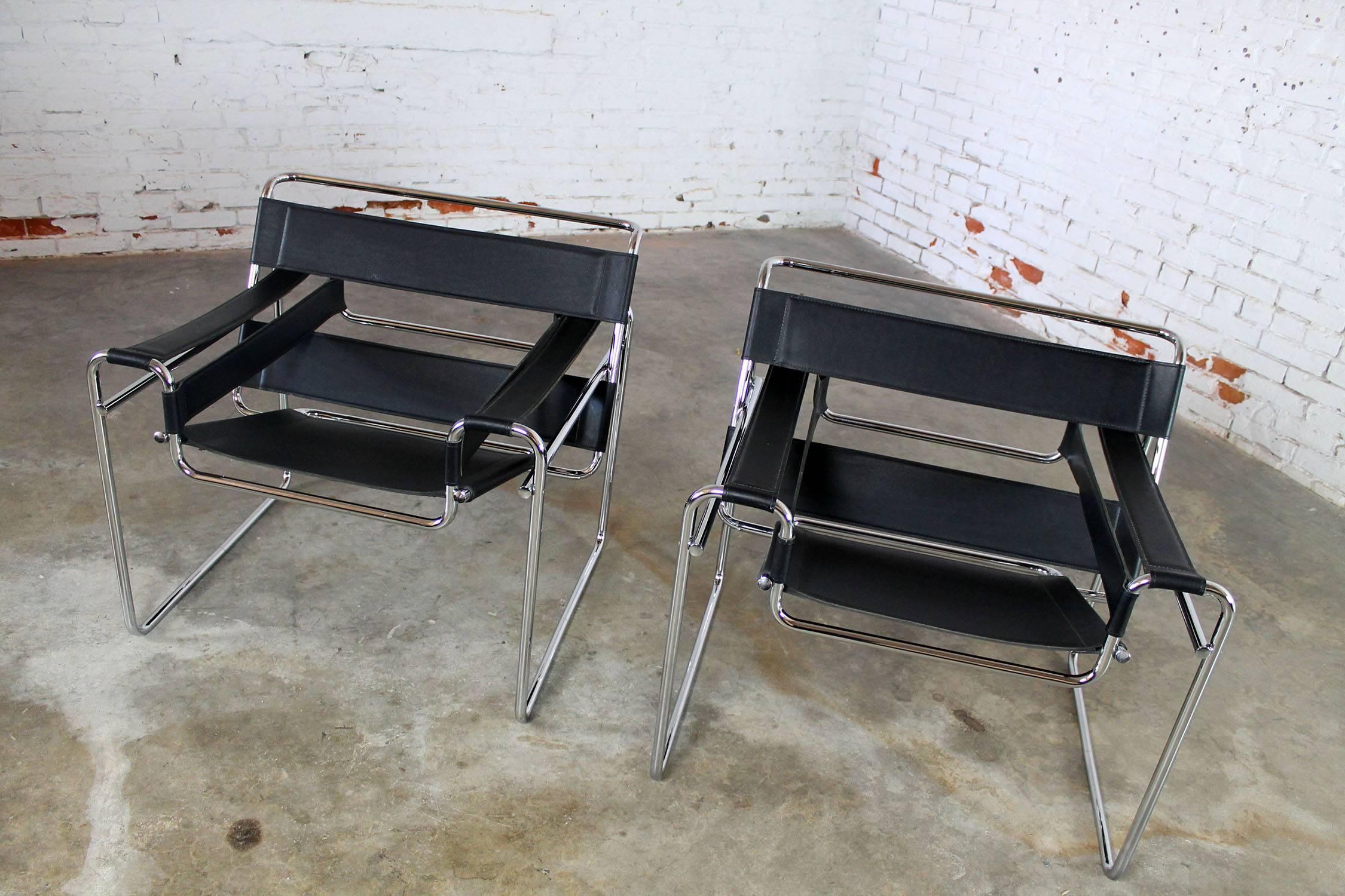Can you get more Classic than this pair of black leather Italian made Wassily chairs by Marcel Breuer? They are in near perfect condition and we believe, circa 1980.

One of the great modern classics! This pair of Wassily chairs by Marcel Breuer