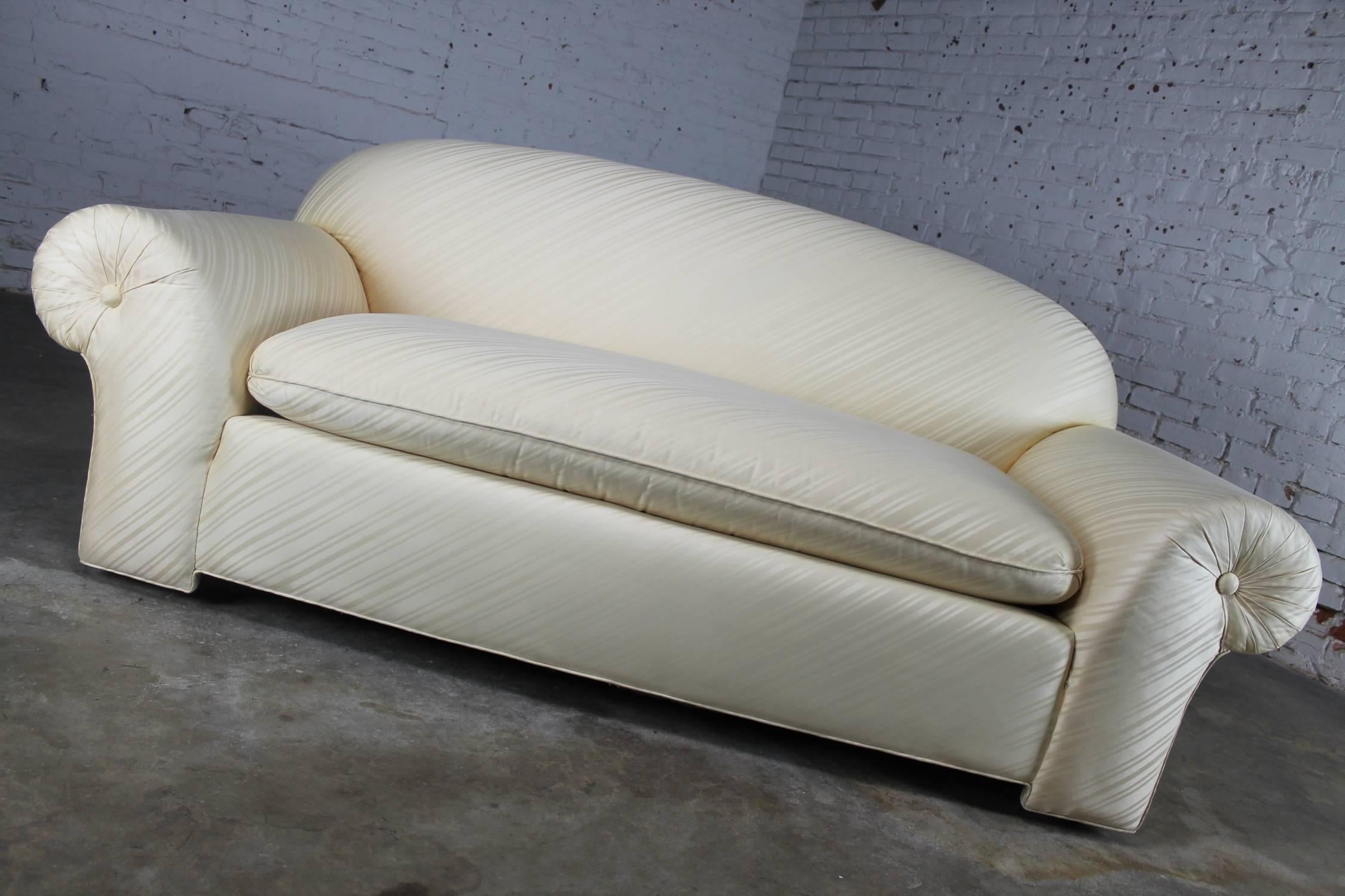 Vintage Donghia sofa circa 1976 in like-new condition. It maintains its original Vice Versa fabric.

This is an awesome vintage Donghia sofa circa 1976. It is in unbelievable mint condition and it is really comfy. It has its original white tone on
