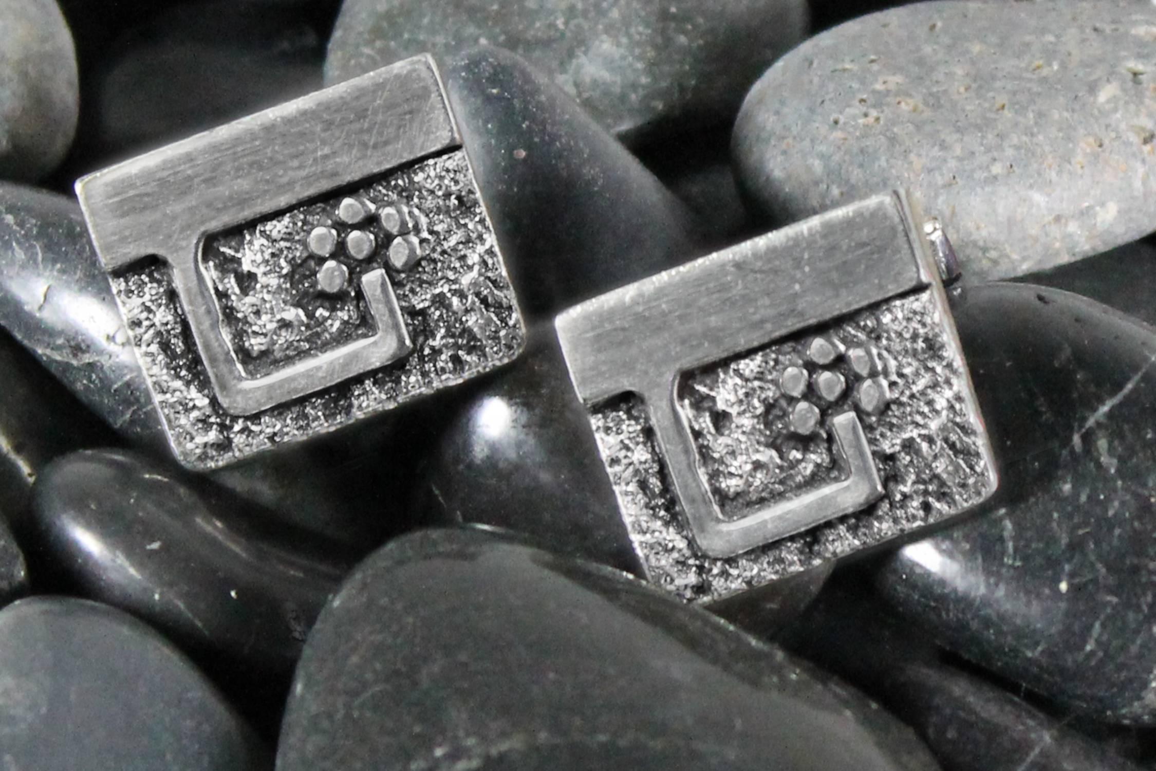 Handsome pair of circa 1970 Guy Gilles Vidal cufflinks, Brutalist style in silver plated pewter. Signed and in good vintage condition.

What a handsome pair of cufflinks by Canadian Montreal-based jewelry maker Guy Gilles Vidal. These wonderful