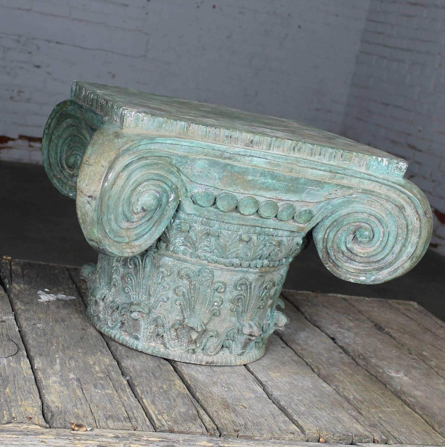 Beautiful, stately and monumental vintage Ionic capital table base or pedestal cast in bronze and patinated. It is in wonderful condition with a very beautiful patina.

This Ionic capital is fantastic! Cast in bronze with a gorgeous patina;