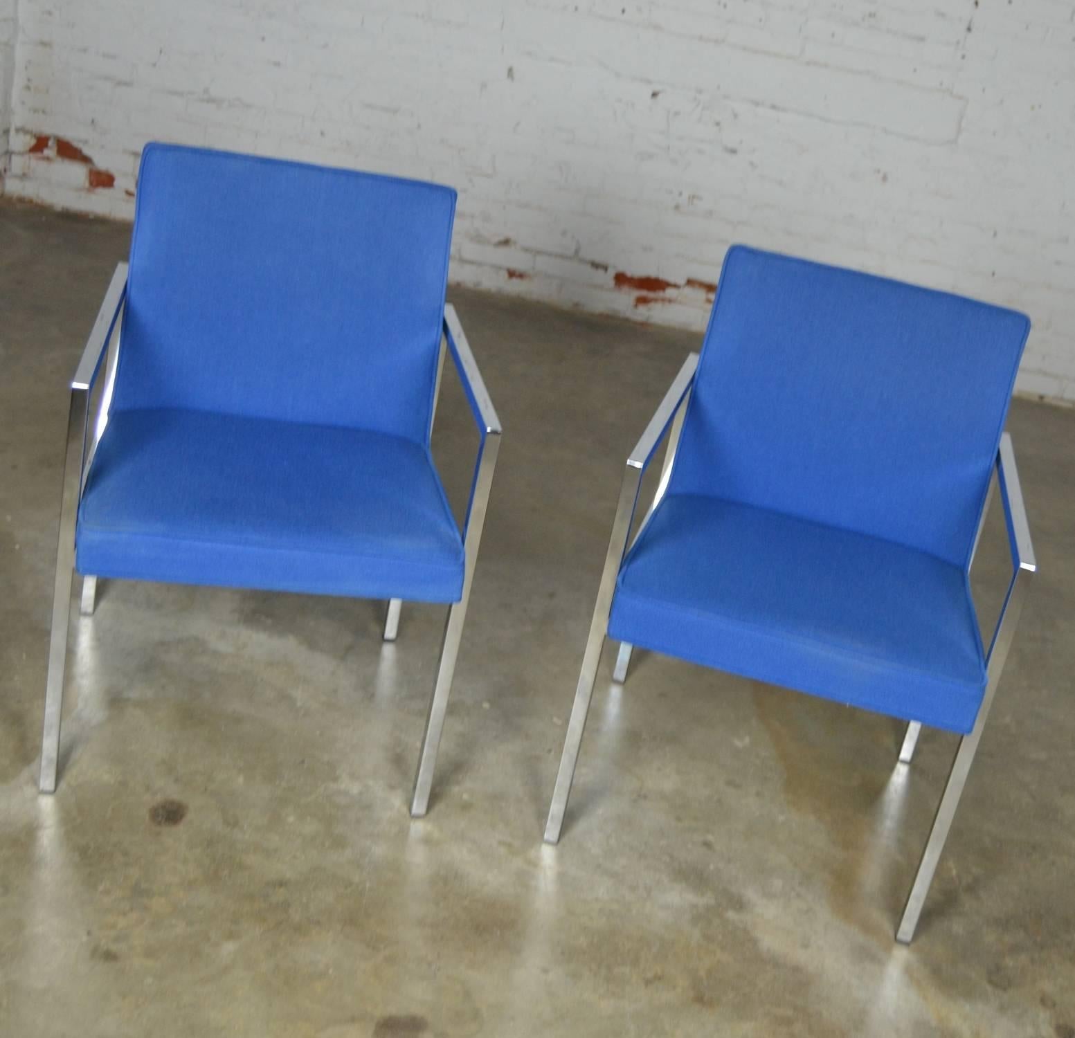 Gorgeous pair of royal blue and chrome armchairs by Hibriten Chair Company of North Carolina in the style of Milo Baughman. They are in wonderful vintage condition and circa 1970.

These chrome and royal blue hopsacking upholstered chairs in the