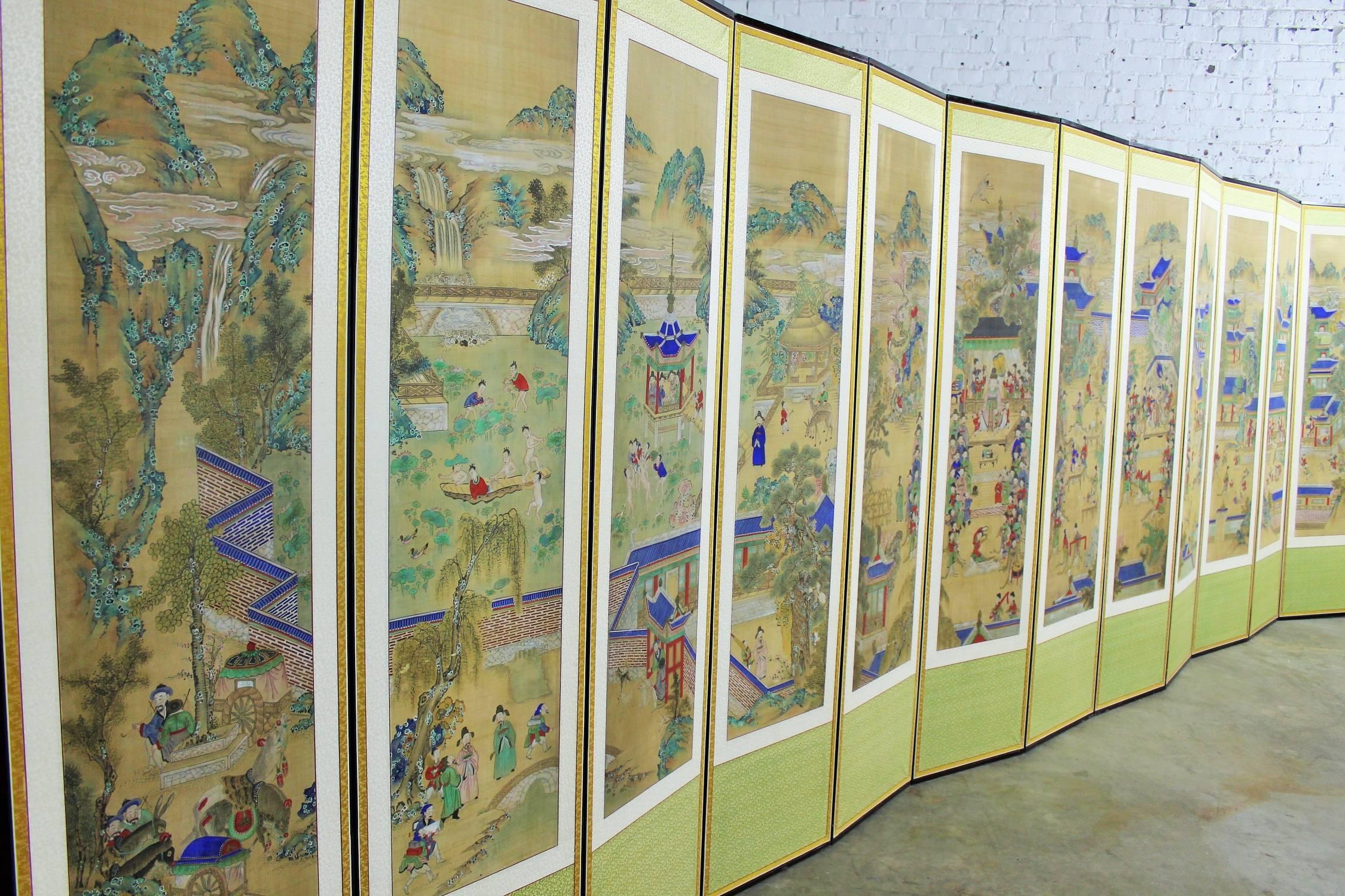 Incredible 19th century Korean folding screen with 12 hand-painted silk panels of bright blue and red and yellow and green. In wonderful antique condition. 

This 19th century Korean screen is a magnificent piece of art! Comprised of 12 panels of