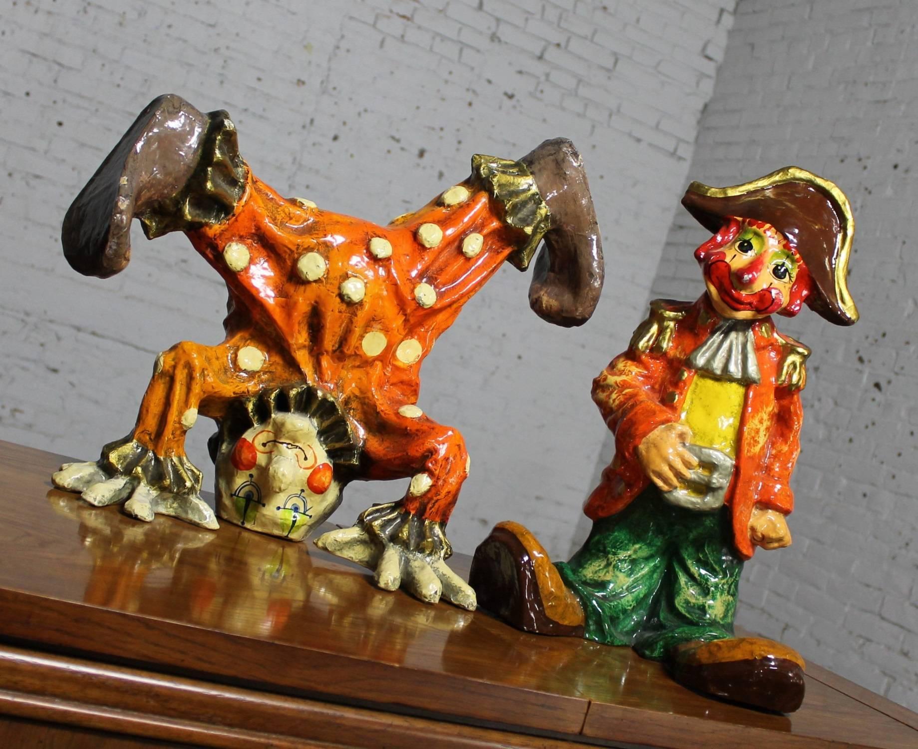 Incredible pair of papier mâché or paper mâché clown sculptures by Jeanne Valentine, circa 1960. The pair is in wonderful vintage condition.

What could be more fun and interesting than a vintage Mid-Century papier mâché sculpture of a clown? A