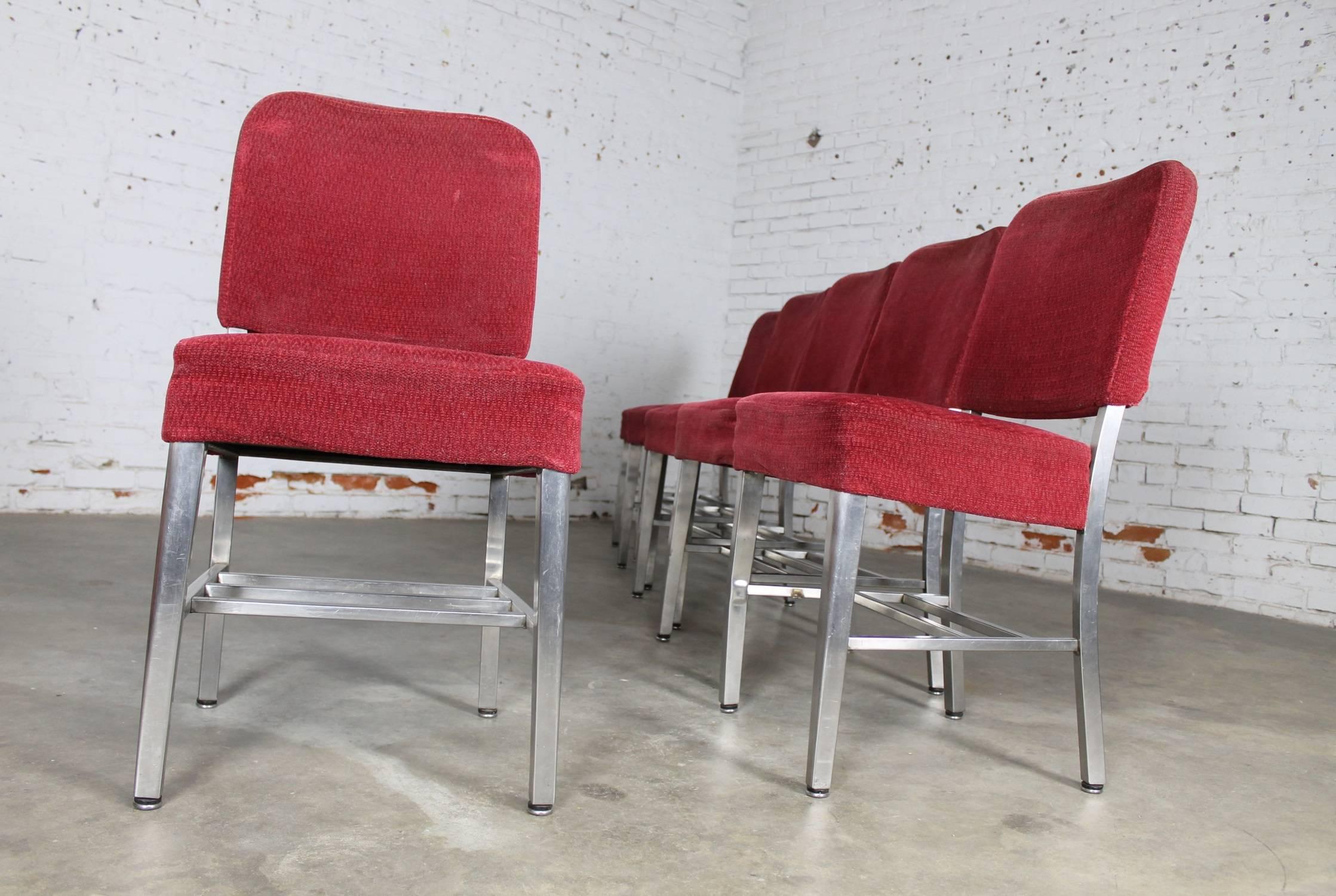 Awesome set of six Art Moderne or streamline railroad dining chairs in stainless steel and original cranberry colored frieze upholstery. Marked with Rota-Cline Coach and Car Equipment Company, Chicago, Illinois. Most likely circa 1920-1940 these