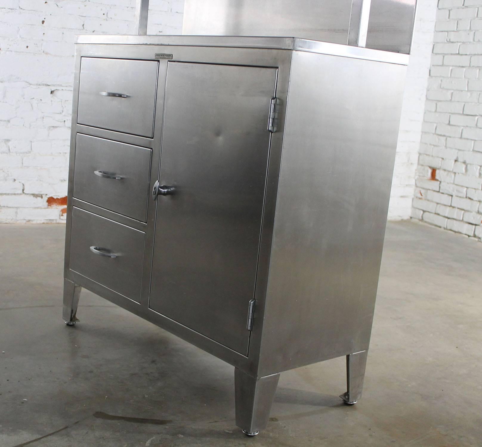 Vintage Stainless Steel Cupboard Industrial Medical Step Back Cabinet In Good Condition In Topeka, KS