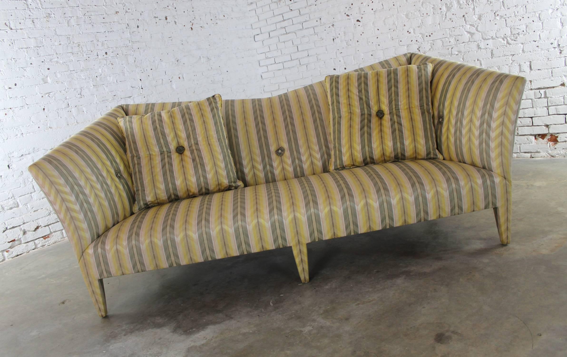Incredible spirit sofa by John Hutton for Donghia. This one is in its original yellow striped fabric and fabulous condition, circa 1990s. The dust cover has been replaced.

This sofa is simply wonderful! It was designed by John Hutton for the