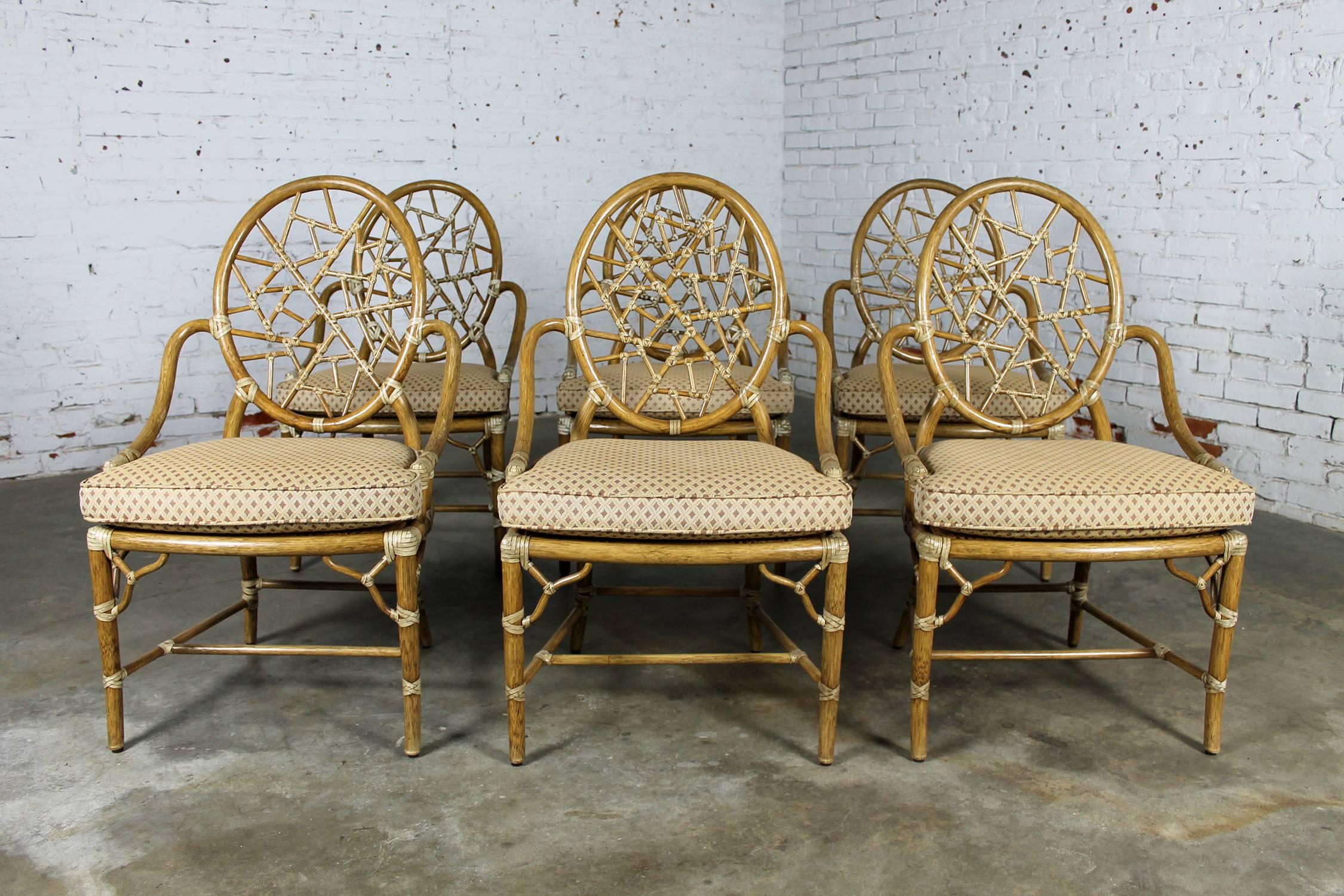 Classic set of six Cracked Ice rattan dining chairs by McGuire. Designed in 1968 by Elinor McGuire. This set is circa 1990 and in wonderful condition.

What an iconic chair! This McGuire staple was designed in 1968 by Elinor McGuire. Defined by