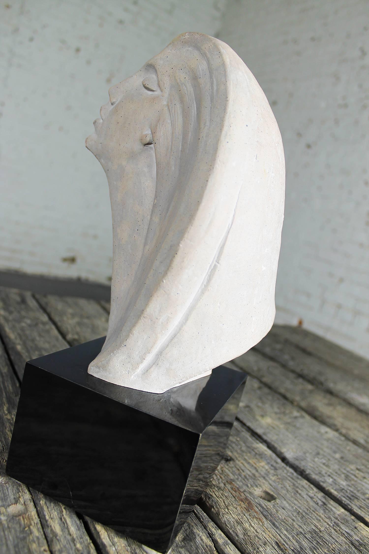 Awesome Mid-Century Modern stylized female bust sculpture titled Stargazer from Austin Productions by David Fisher, circa 1980. It is in wonderful vintage condition with no flaws we have found.

This is an incredible Mid-Century Modern sculpture.
