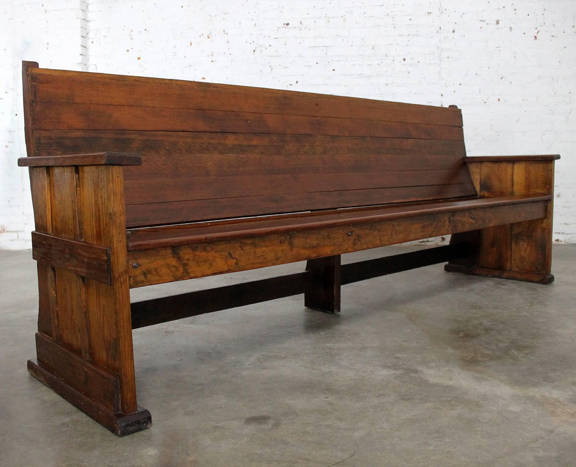 Gorgeous rustic pine 19th century bench or pew. This fabulous antique piece is in wonderful condition with loads of beautiful patina.

This bench is outstanding! The antique pine is phenomenal, it has the warmest age patina you can imagine. The