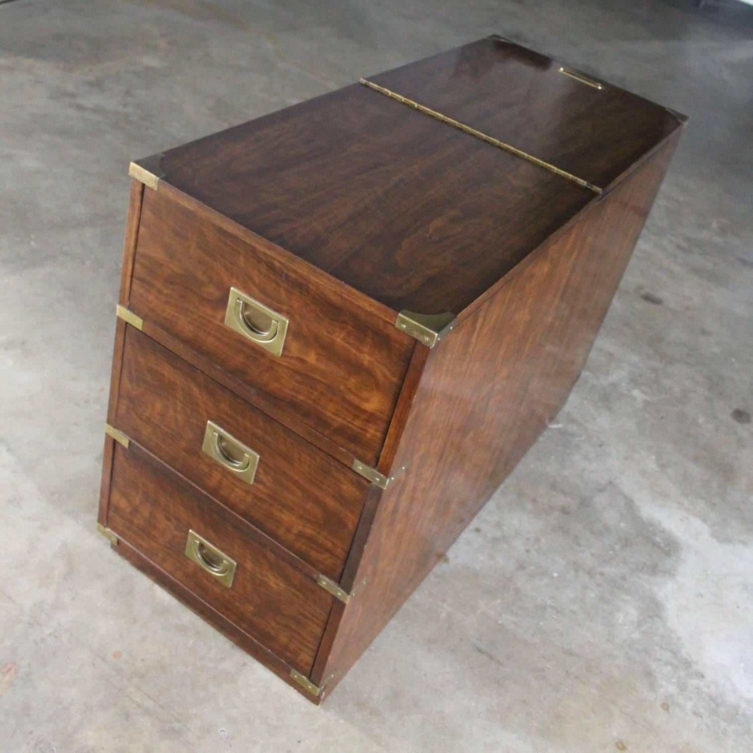 Unique and interesting Campaign style chest type dry bar by Drexel with flip-top and three drawers. In fabulous vintage Mid-Century condition, circa 1980.

This is quite the handsome and unique dry bar. Made by Drexel, circa 1980s in the ever so