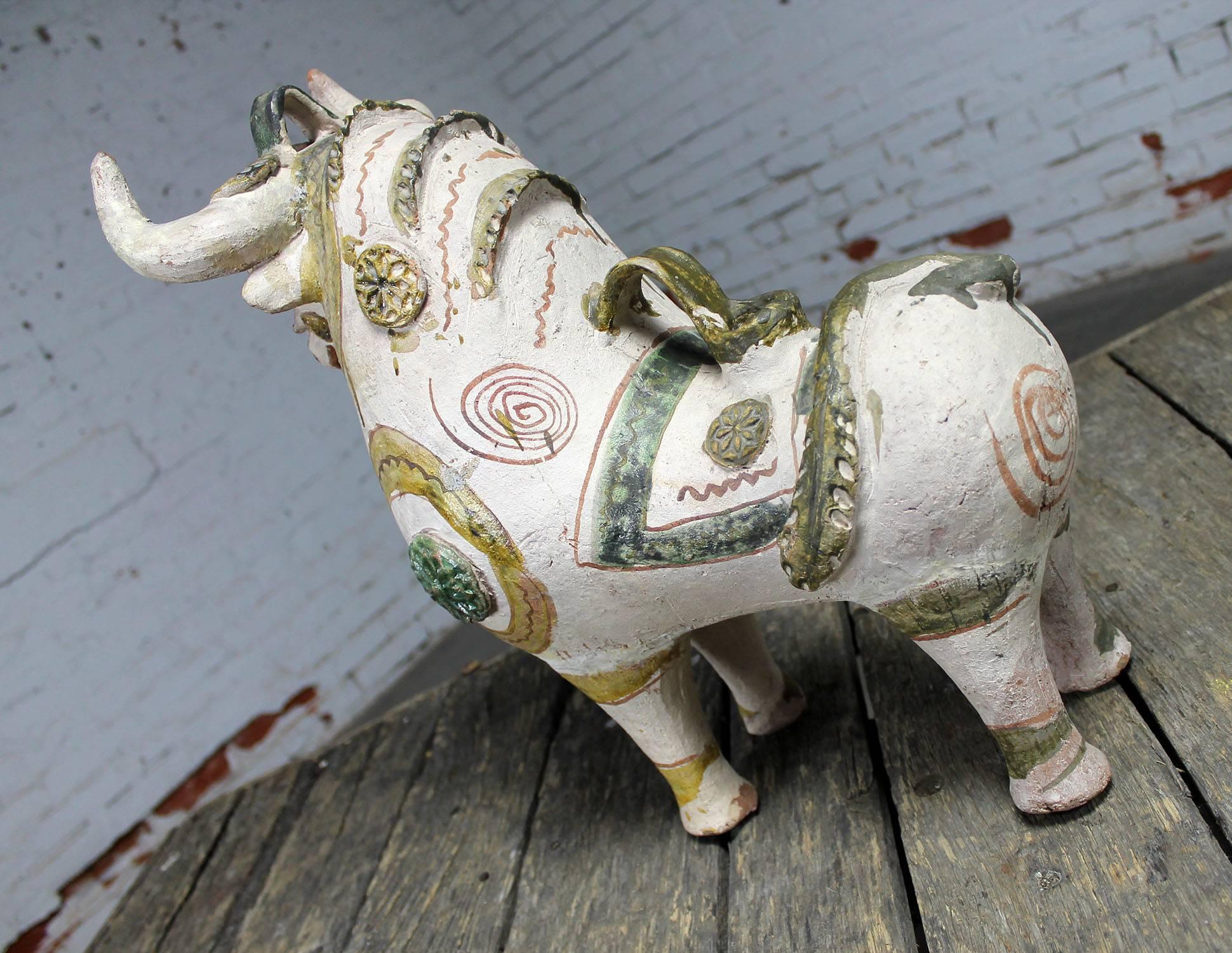 Antique Torito de Pucara Peruvian bull pottery vessel. This piece is in wonderful vintage condition with no outstanding flaws. We believe him to be circa 1900-1950.

What a proud and handsome bull! This Torito de Pucara we believe to be from the