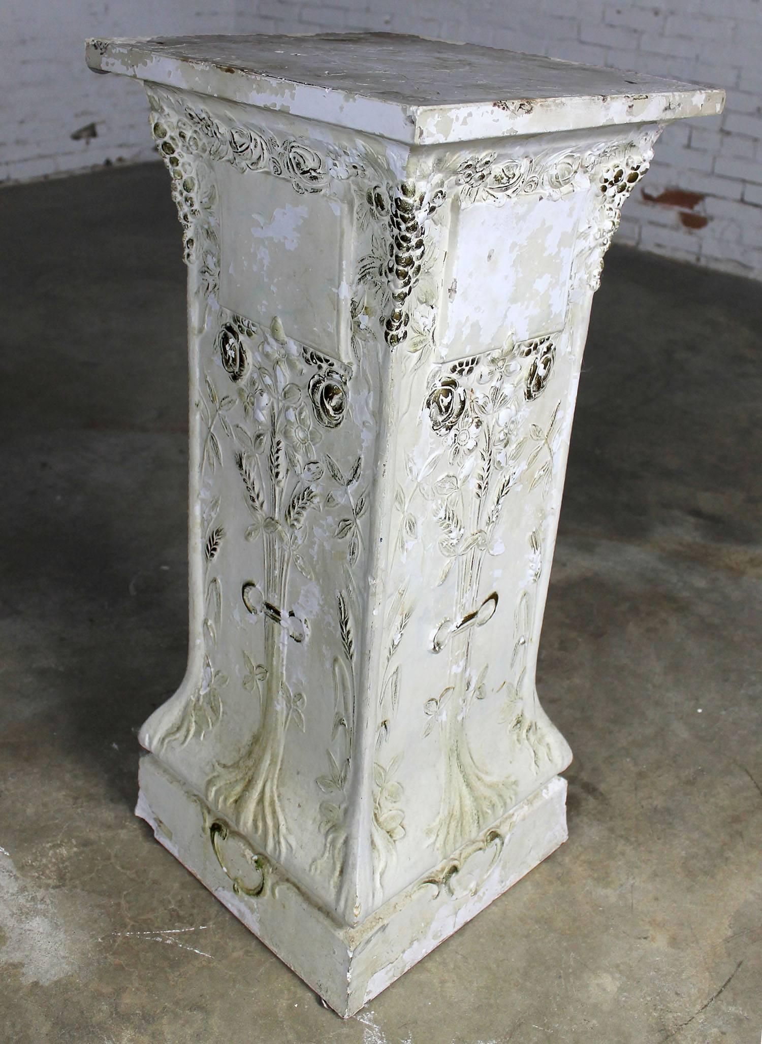 Elegant, lovely, and ornate antique plaster pedestal from an old church. In good condition for age; however, not without chips and cracks and peeling paint. Of course, I believe those only add to its interest and beauty. Shall we call it patina?
