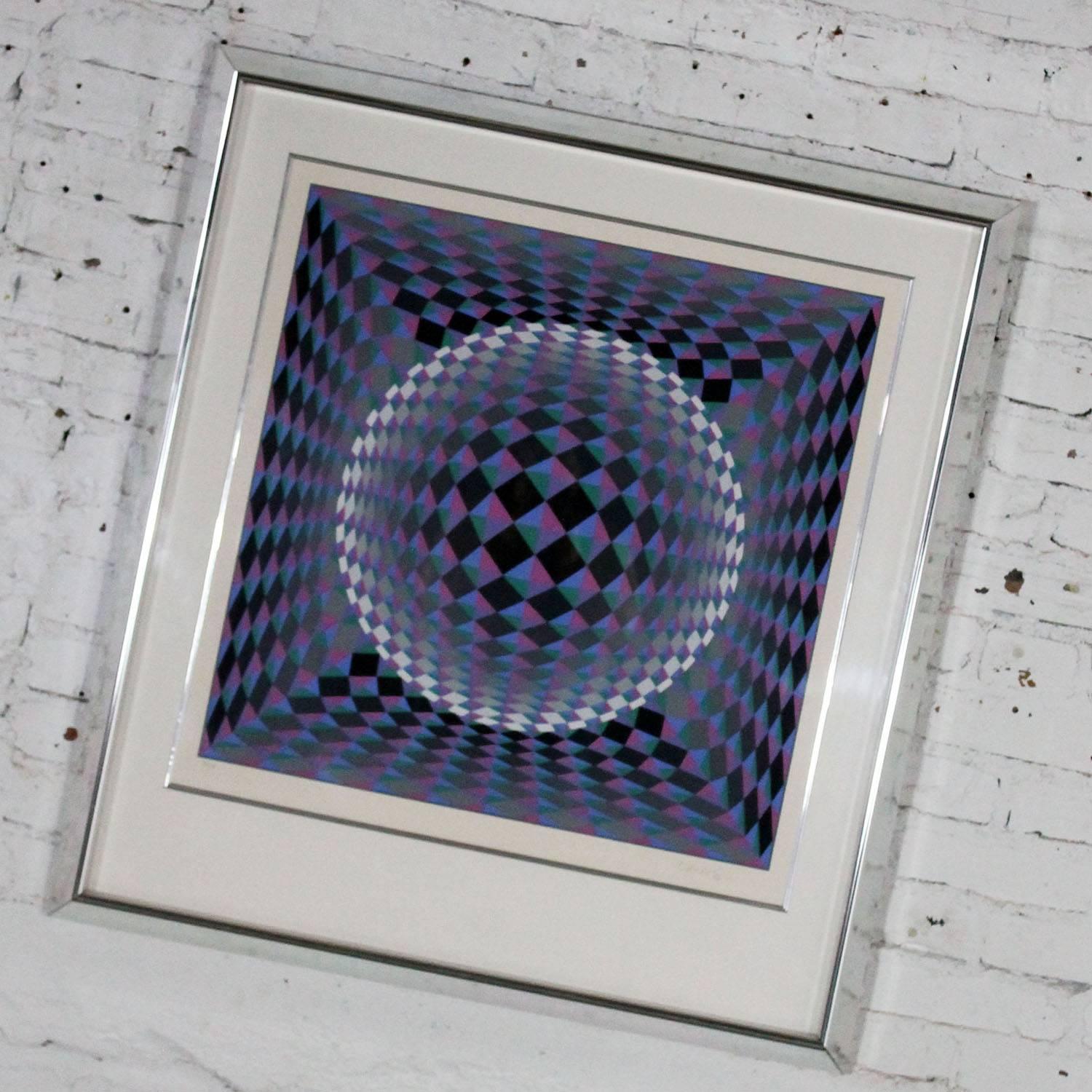Incredible serigraph by world renowned Kinetic and Op Art artist, Victor Vasarely. This piece is titled Athmos and is pencil signed and numbered 253/300. It was originally sold by Park West Galleries, circa 1985 and has a registration number of