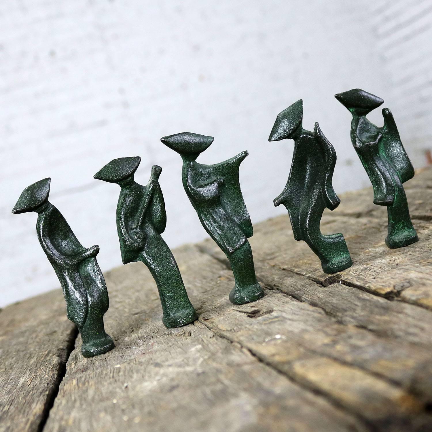 Fun and interesting set of five Geisha figures cast iron with a green patinated finish. These four-inch-high Japanese figurines are in fabulous vintage condition circa 1930s-1970s.

This little set of five dancing and instrument playing Geisha