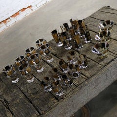 Set completo di bicchieri da bar e monete in oro 22 carati e nero di MCM by CERA