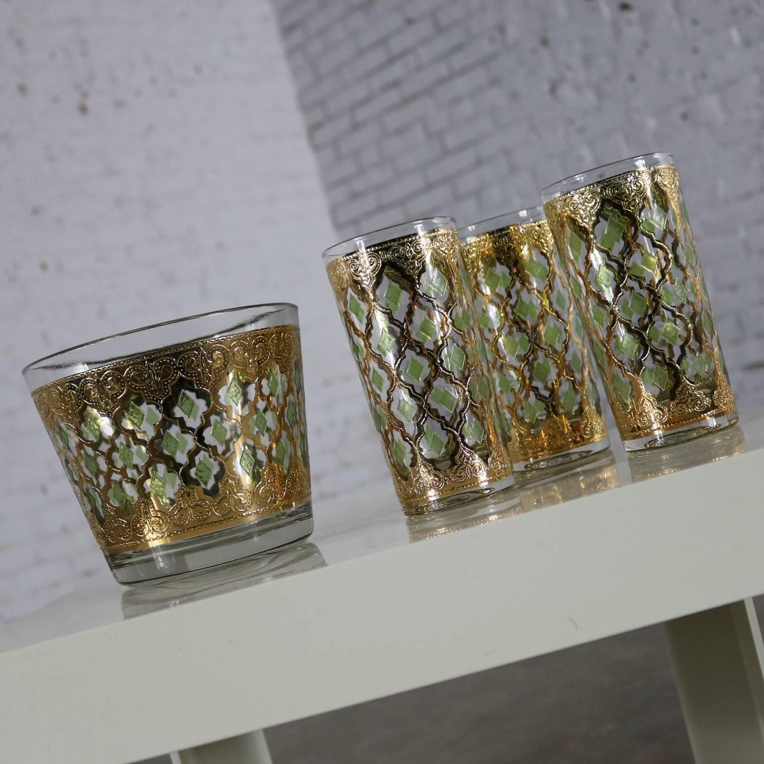 Four beautiful pieces of Culver Glass Company’s Valencia pattern in 22-karat gold. One glass ice bucket or bowl and three highball cocktail glasses. These are all in wonderful vintage condition apart from missing gold to the upper ring of the gold