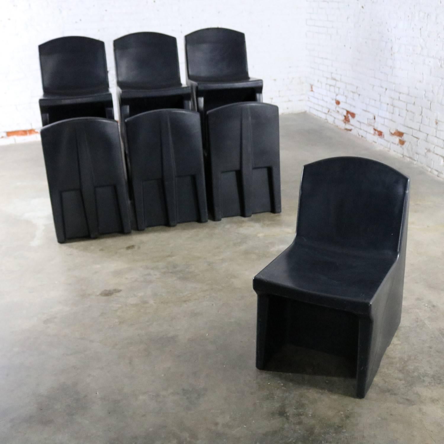 Fun and useful set of ten black molded polyethylene plastic side or slipper chairs by Norix from the Toughcare series. In fabulous condition and ready to use, circa 21st century.

These chairs aren’t designed by some famous designer or made by a