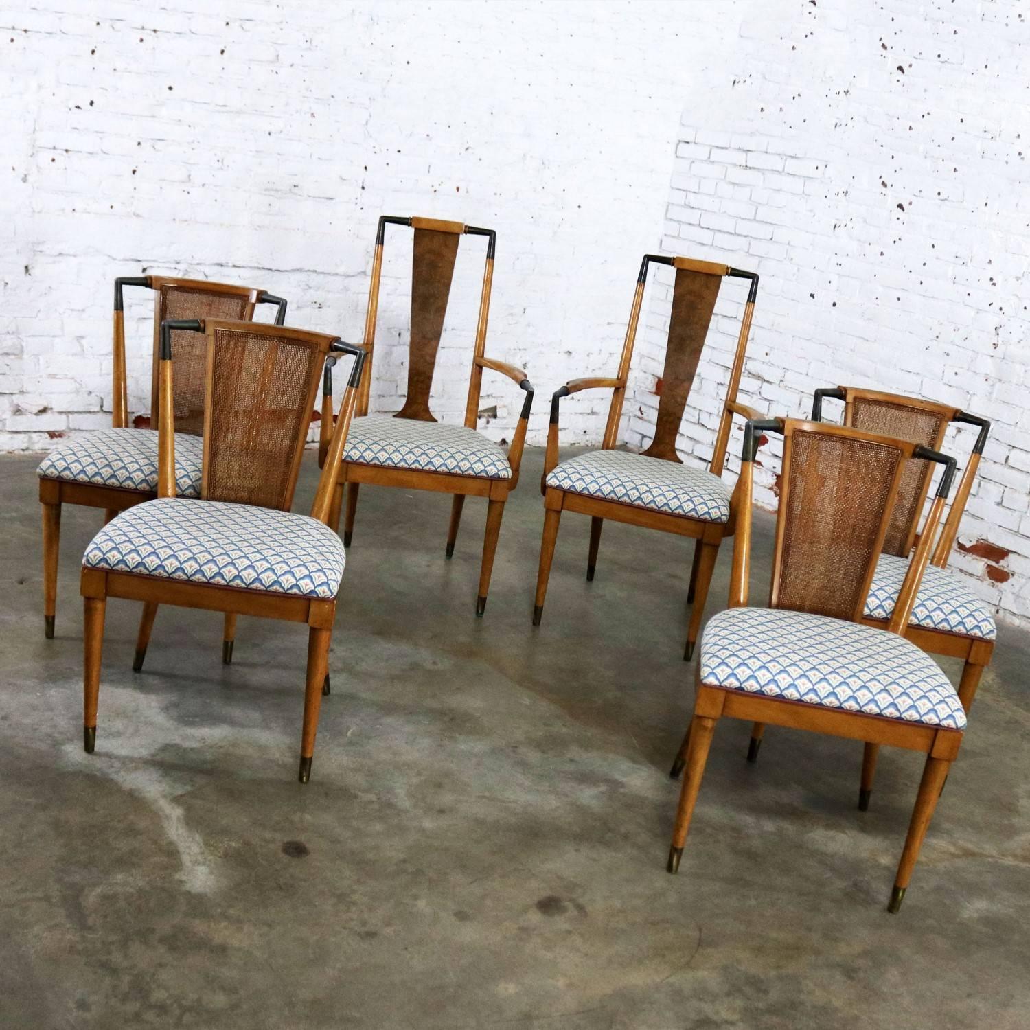 Handsome set of six mid-century modern dining chairs attributed to William Clingman for J. L. Metz Furniture’s Contempora Collection. Featuring metal accents and cane backs. The set consists of two arm chairs and four side chairs. They are in