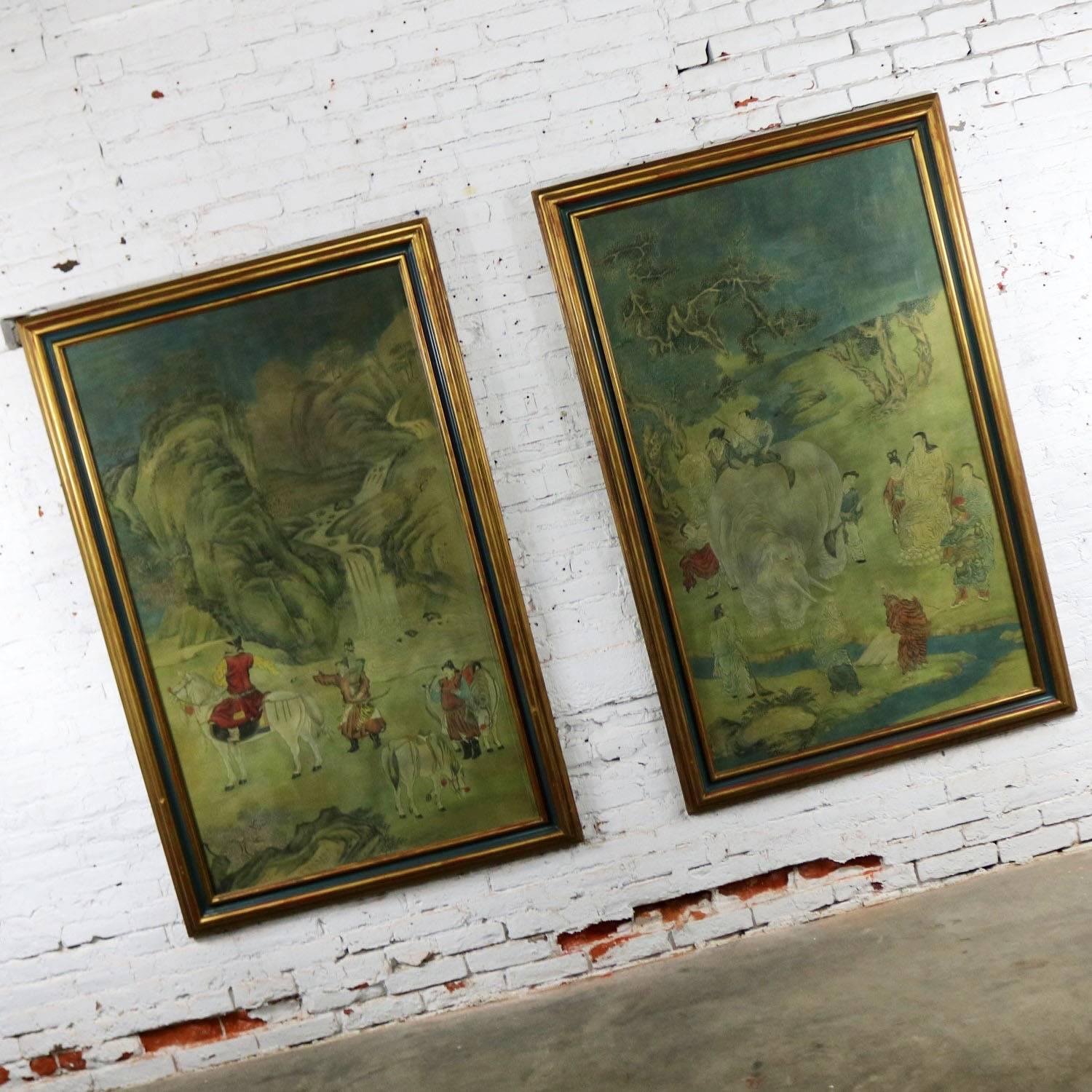 Gorgeous pair of monumental sized Chinese art. Ink and color on paper depicting landscape and figural scenes. This unsigned pair are mounted on hardboard and framed under glass. They are in wonderful vintage condition. We believe the frames to be
