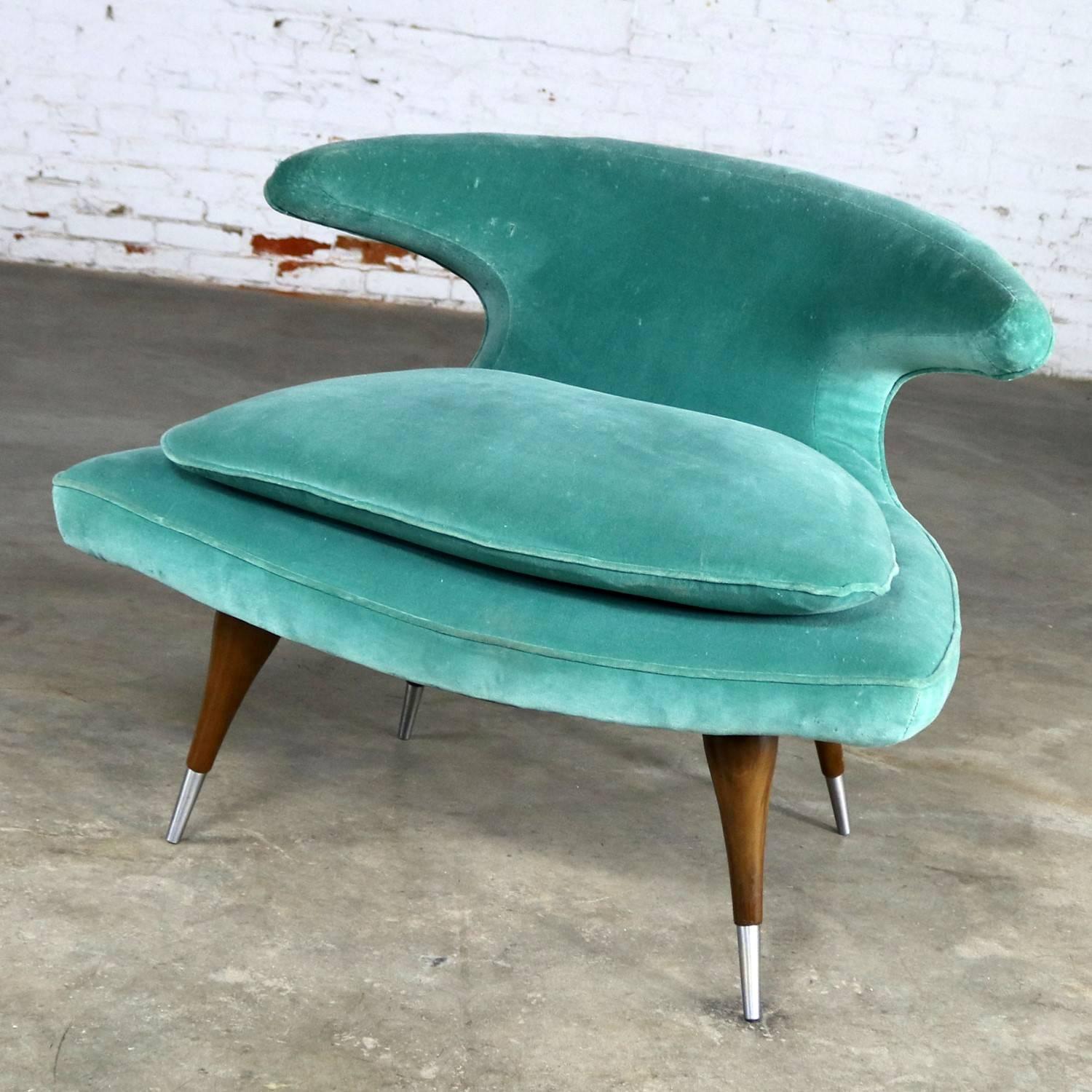 Awesome MCM horn chair by Karpen of California in turquoise velvet upholstery and walnut legs with silver-tone metal sabots. This chair is in wonderful condition structurally, the foam is soft, and the legs are excellent; however, the original