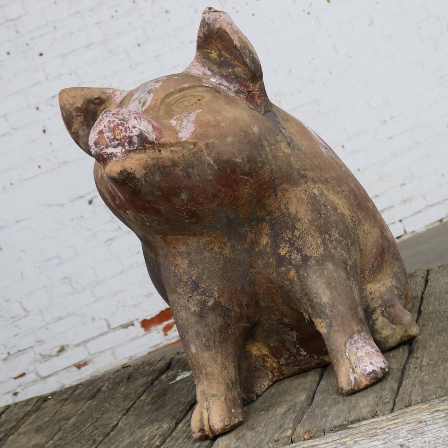 Adorable very large near life-size terracotta pig planter or pot. This guy is in great shape with wonderful patina. He does have a few cracks, nicks, and dings but they only make him look better. We do not know his exact age but feel he is late 20th