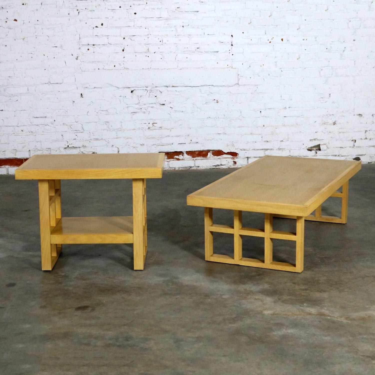 Incredible pair of Mid-Century Modern blonde oak tables with a window pane leg design. One end table and one coffee table. They are in wonderful vintage condition with normal wear for age and use. Please see photos, circa 1950s.

Cool, cool, cool
