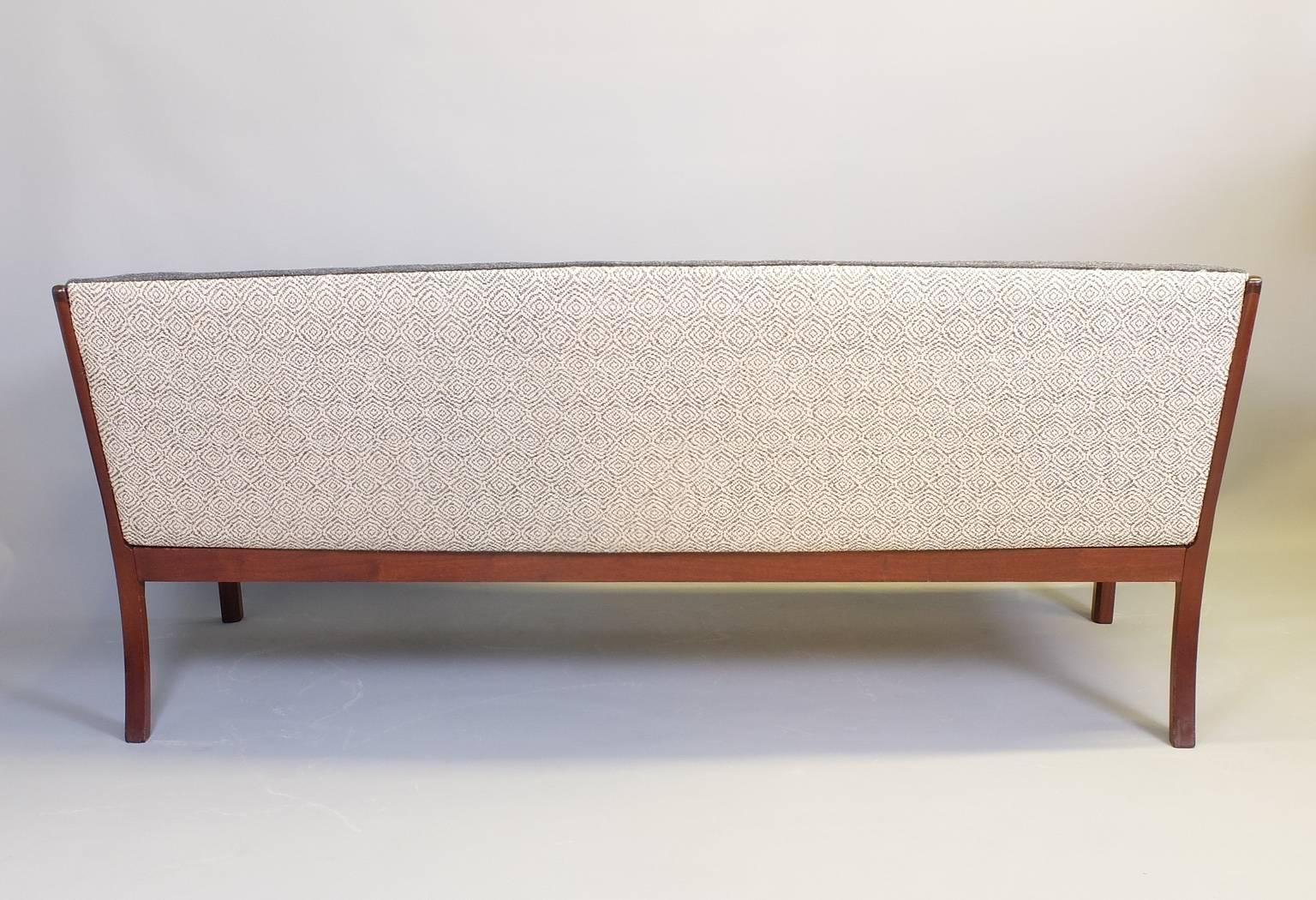 Mid-20th Century Ole Wanscher for Poul Jeppesen Mahogany Sofa and Pair of Lounge Chairs, 1950s