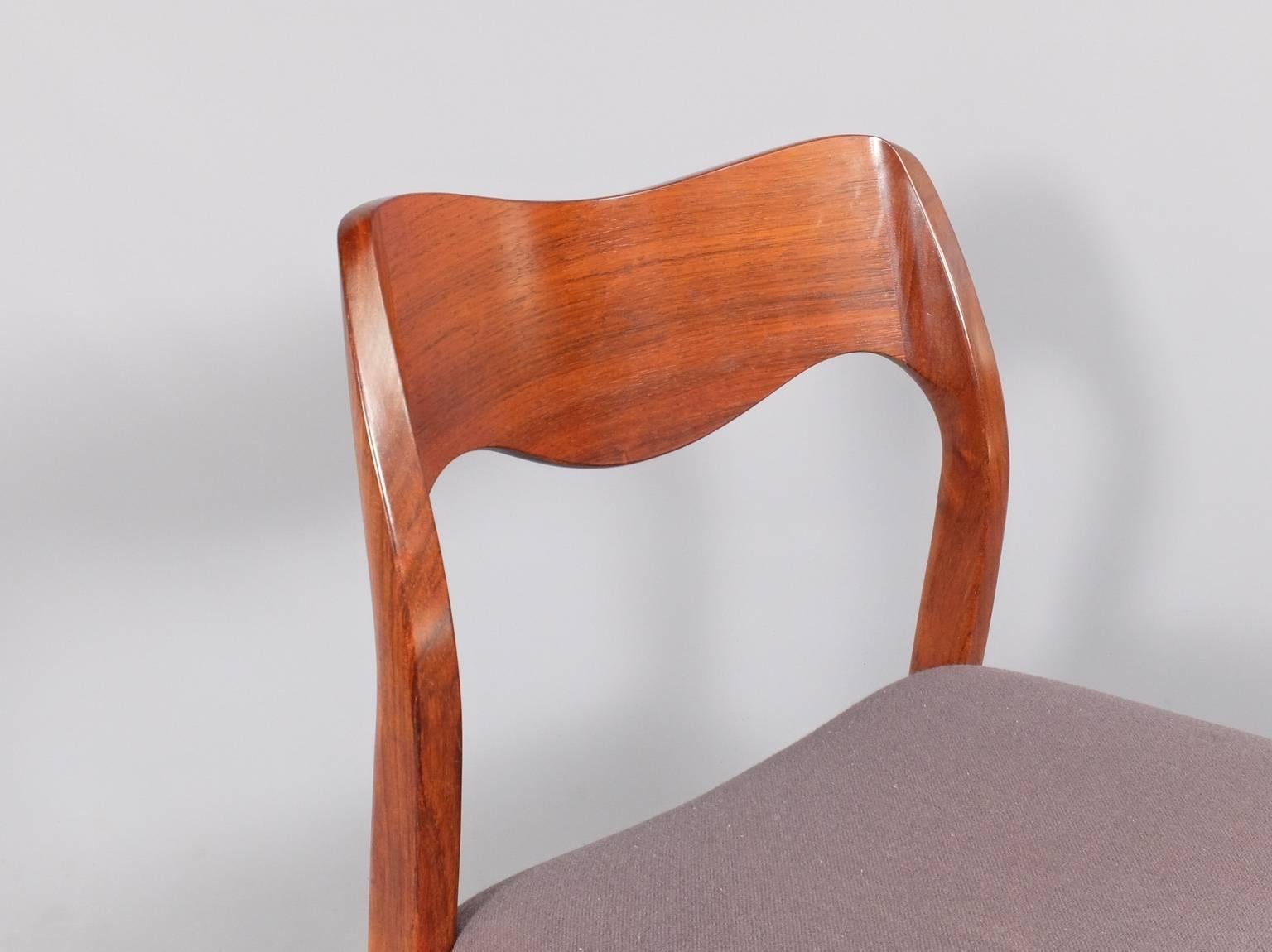 A beautiful set of Danish Modern Mid-Century dining chairs in beautifully figured timber. Designed by Arne Hovmand Olsen and produced by J L Moller in the 1960s. These are Model 71 with a wonderfully deep and comfortable, curved backrest. The seats