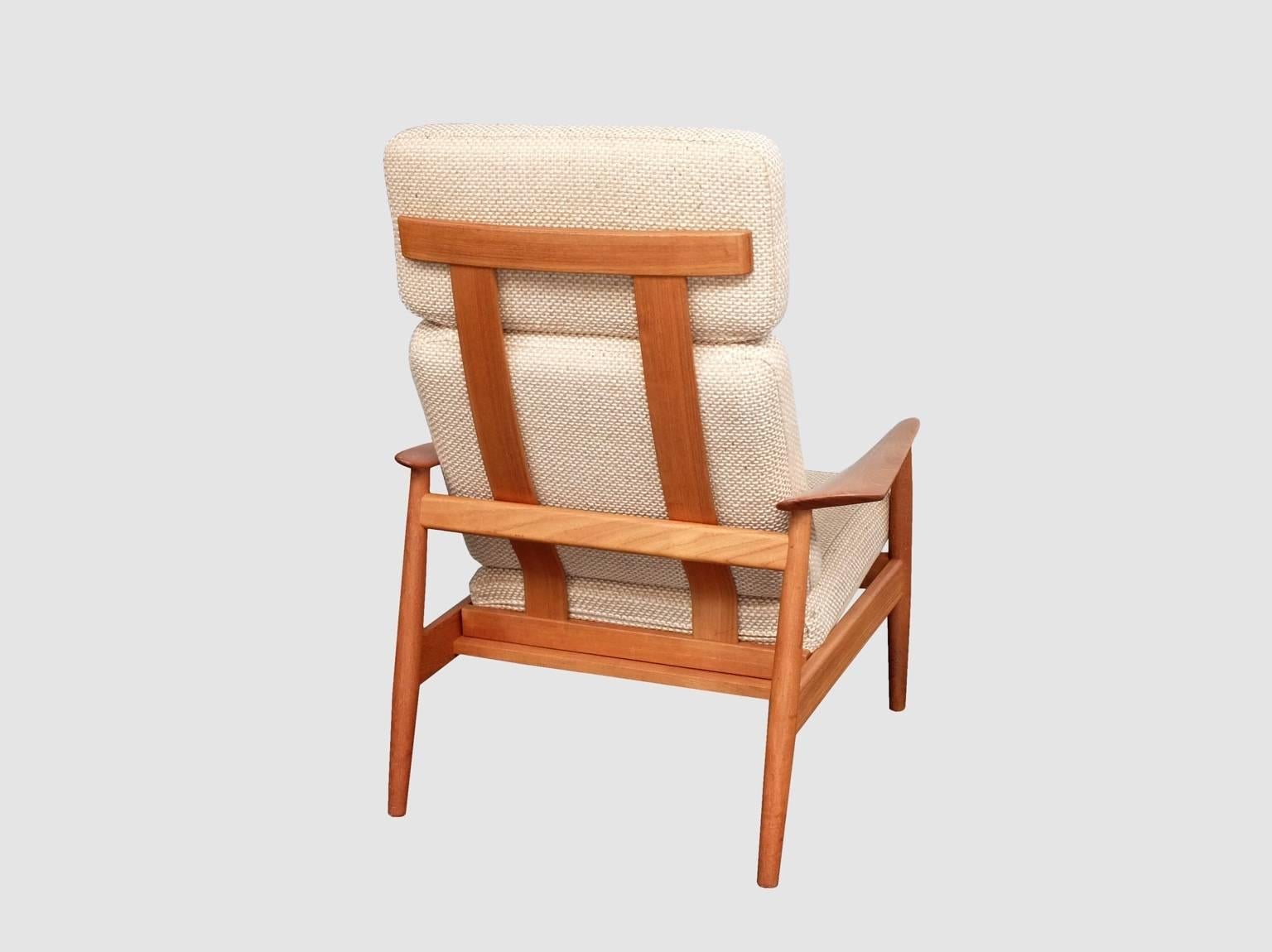 Designed by Arne Vodder and produced by Cado (France & Son) in Denmark in the 1960's. This chair can be fixed in three positions, which are shown in the photos. The cushions are the originals and are in good condition but can be re-upholstered in