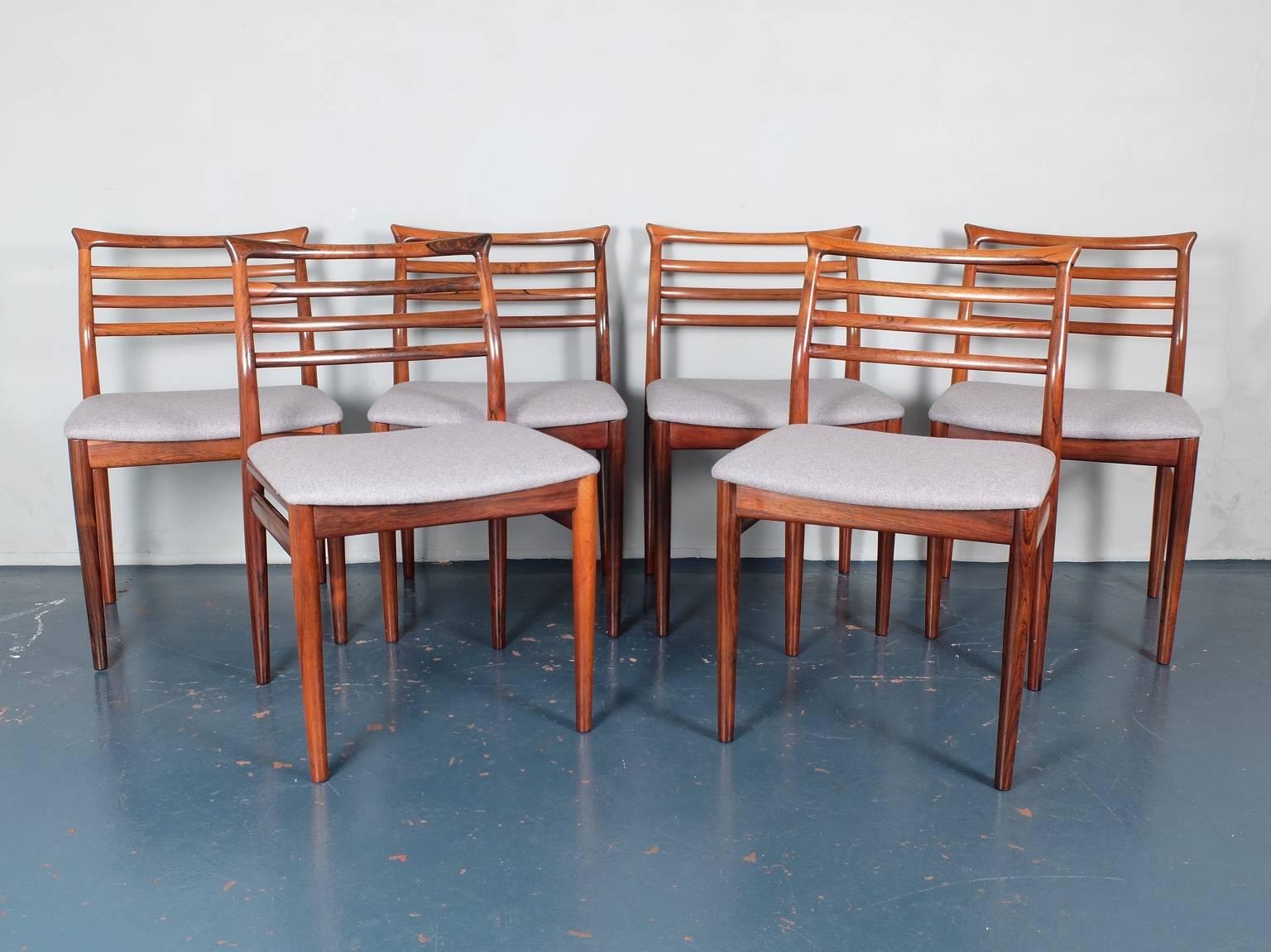 A set of six dining chairs designed by Erling Torvits and produced by Soro Stolefabrik, Denmark, circa 1960. The frames are constructed entirely of beautifully figured solid Brazilian rosewood and are all in excellent condition. We have